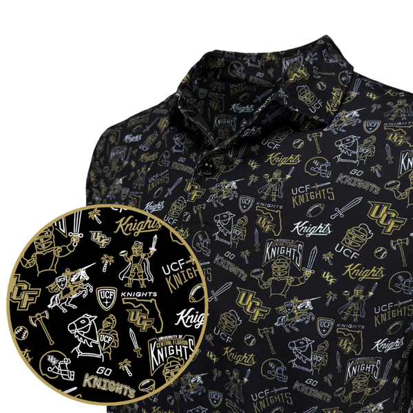 A black long-sleeve collared shirt with an all-over UCF Knights graphic print in white and gold, featuring football helmets, swords, buckles, and team logos. A circular inset zoom-in is shown in the lower-left corner to highlight the detailed print.