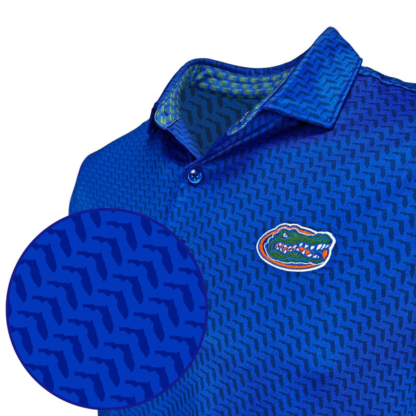 Blue patterned shirt with a logo on a white background