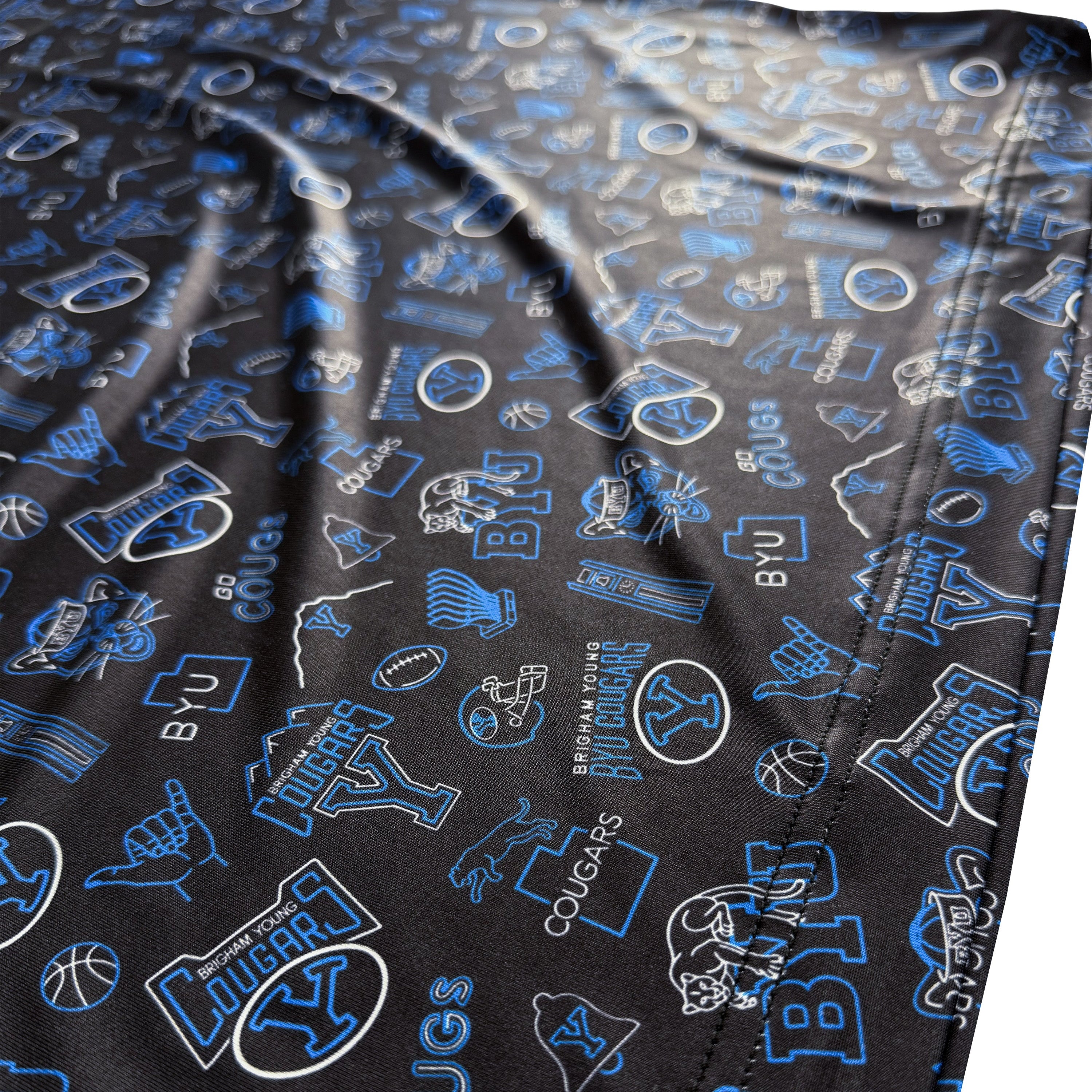 Black fabric with blue and white logos and text, including 'BYU' and 'Cougs'.