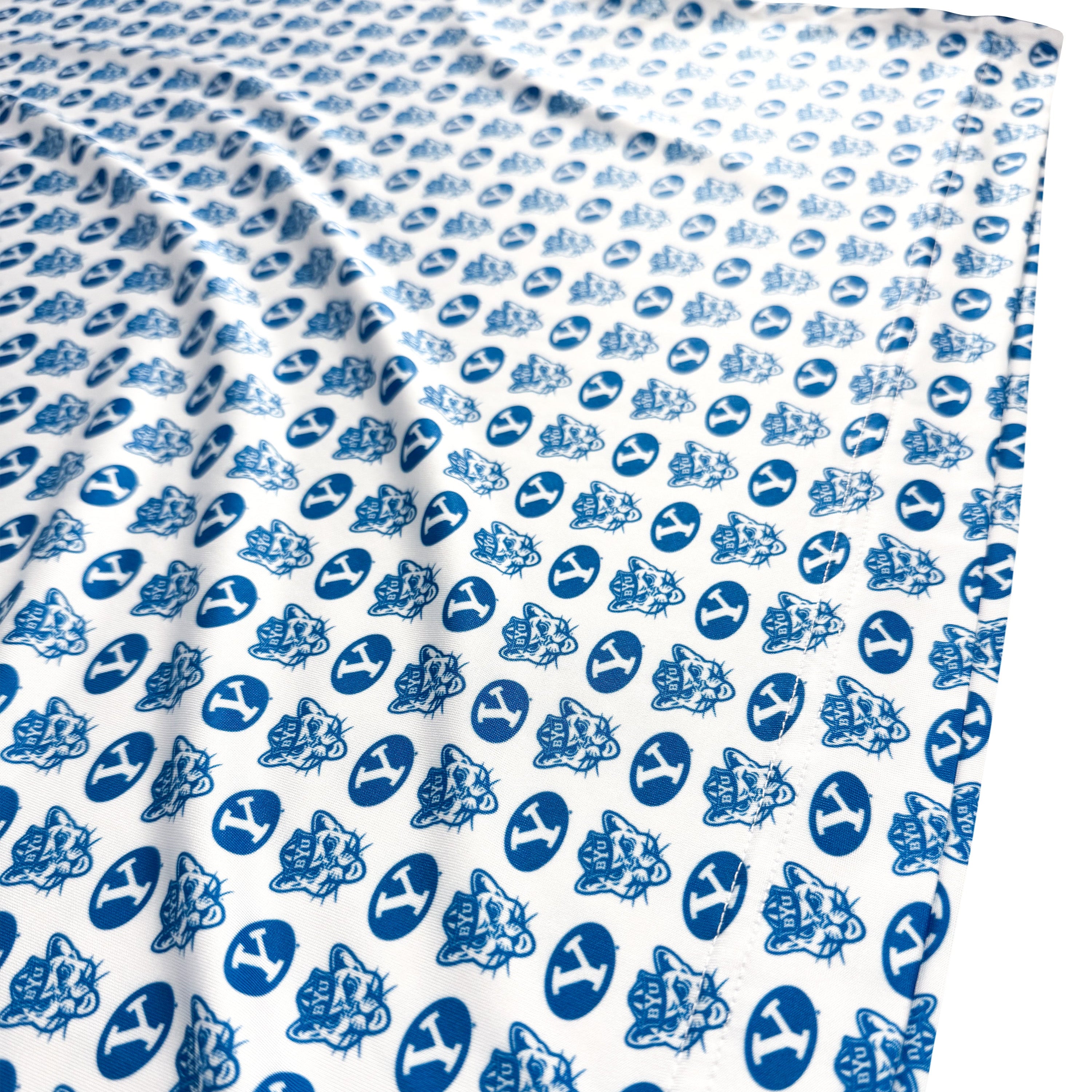 White fabric with blue sports-themed pattern