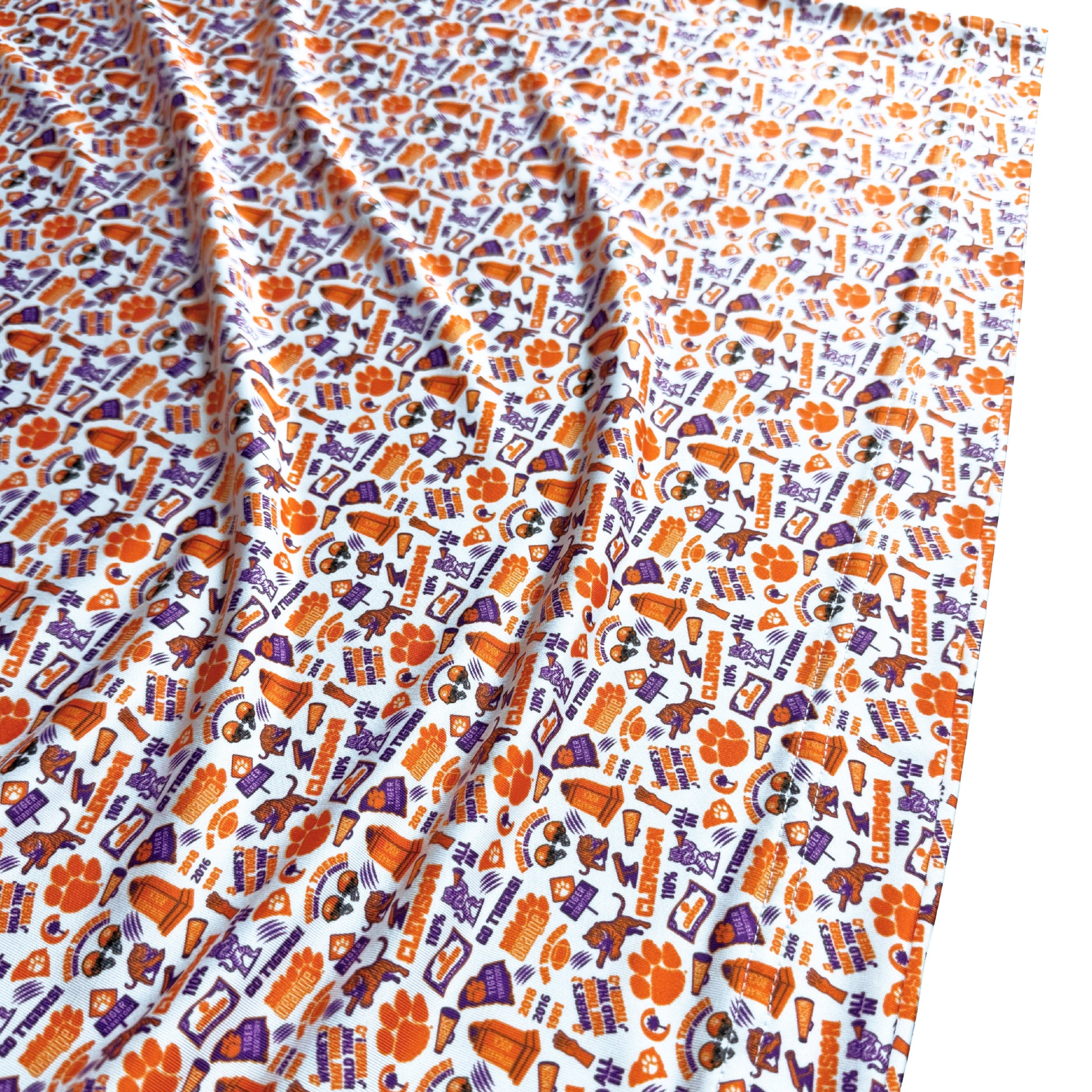 Polo with Clemson University logo pattern on a white background