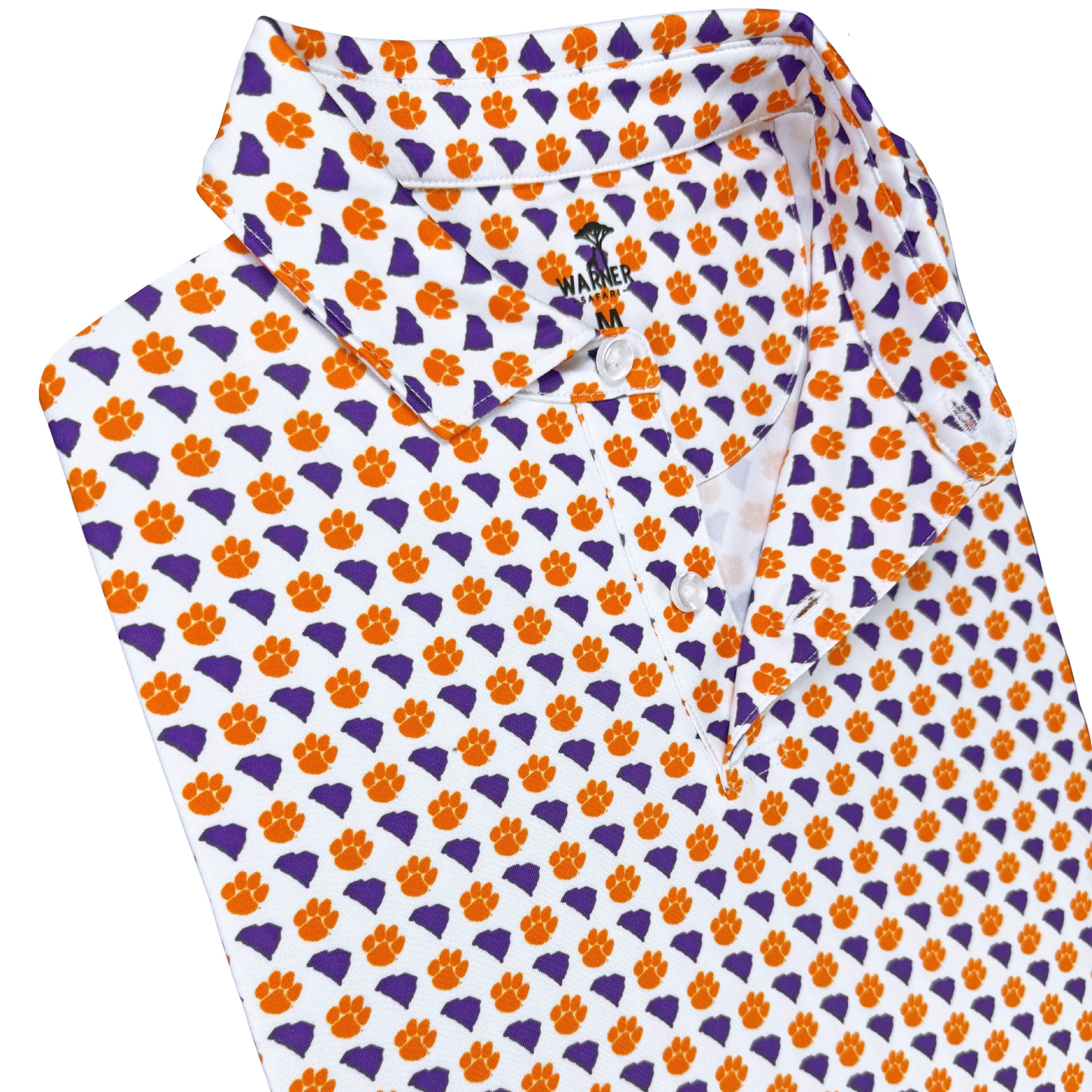 Folded shirt with orange and purple pattern on a white background