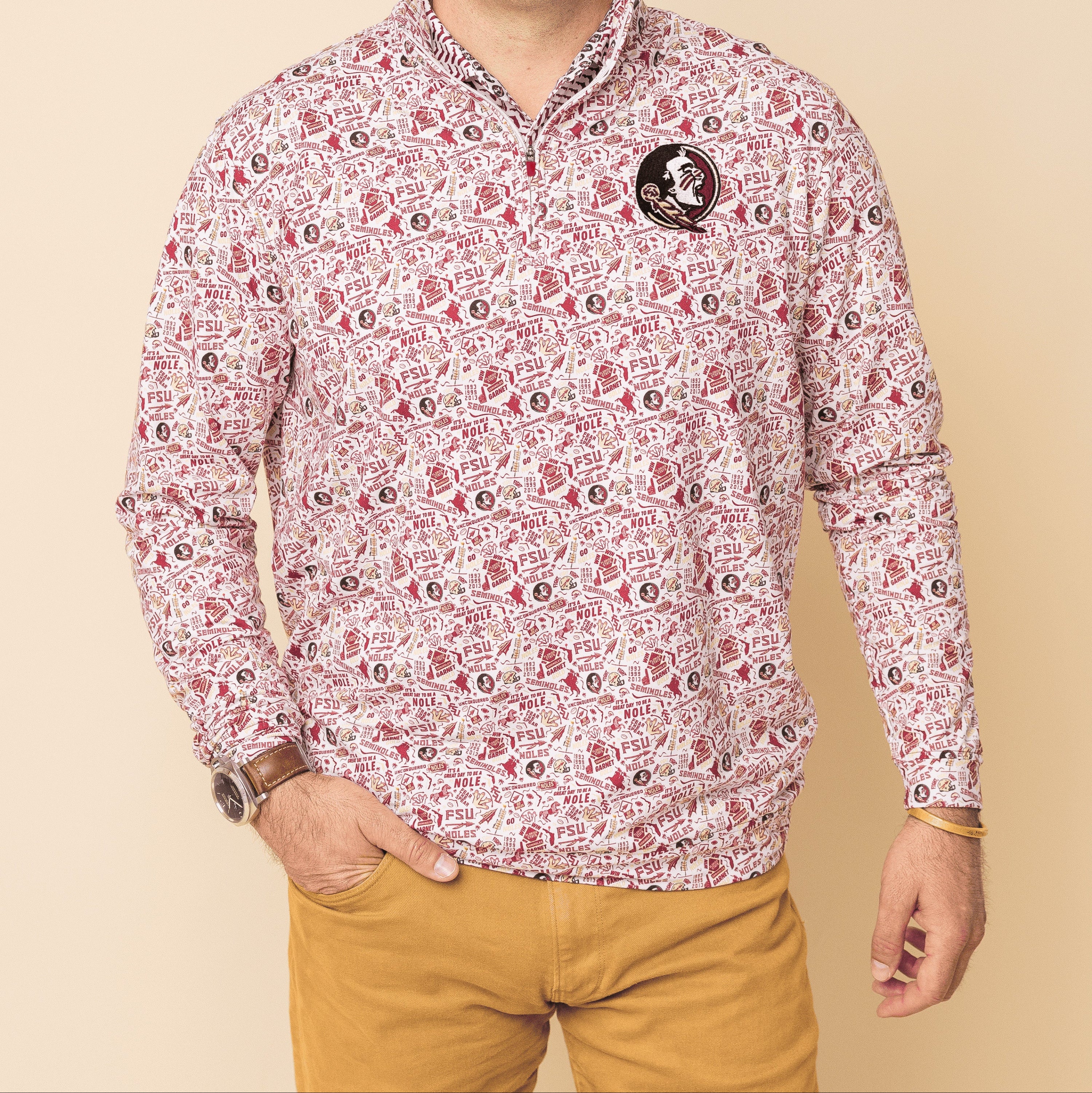 Man wearing a patterned shirt with a beige background