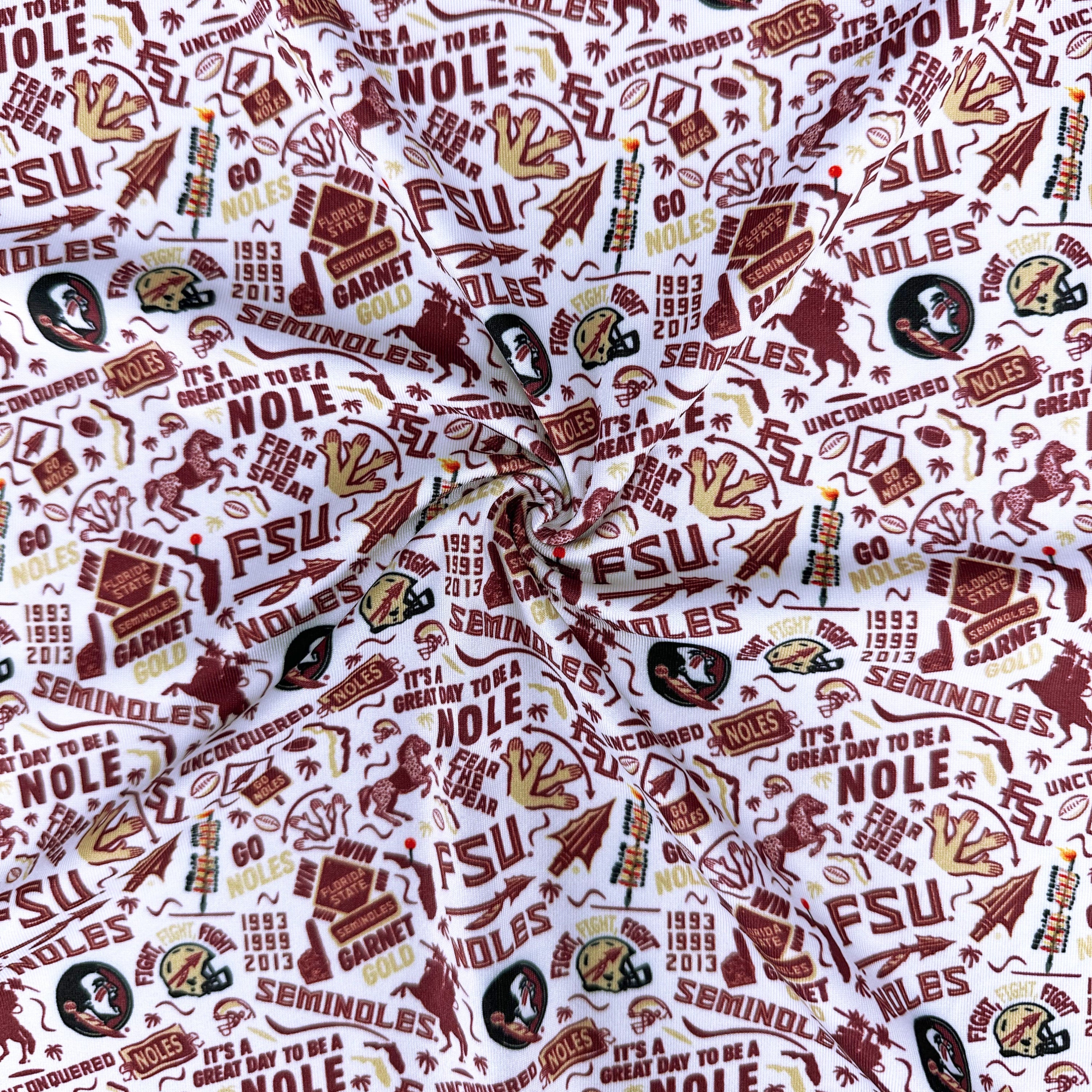 Patterned fabric with Florida State University logos and text on a white background