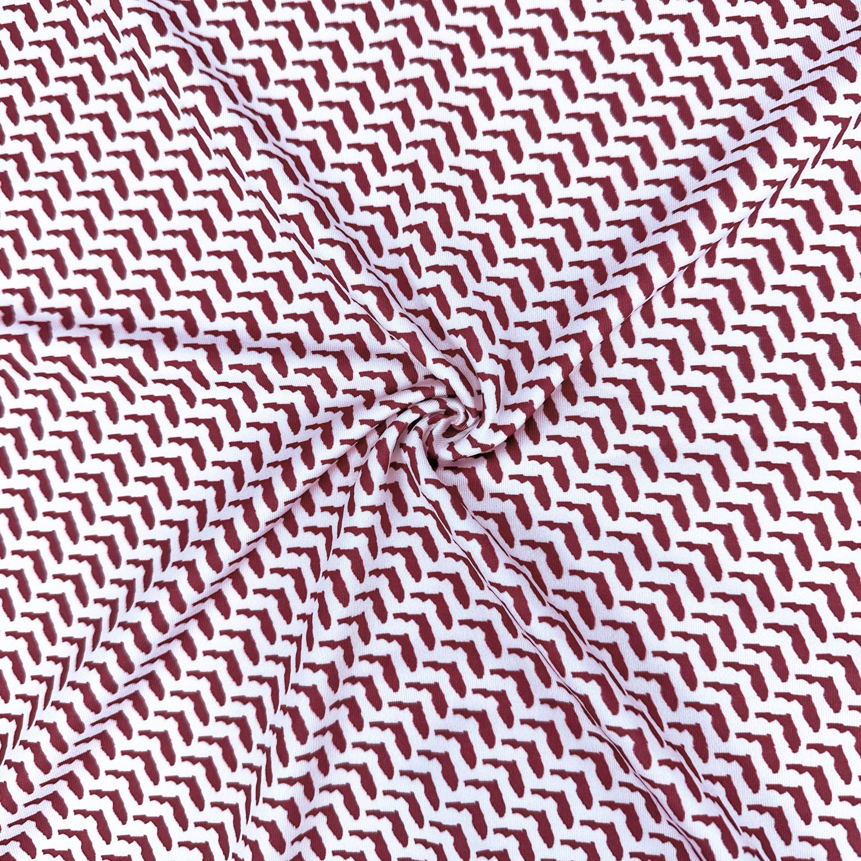 Fabric with a red and white geometric pattern