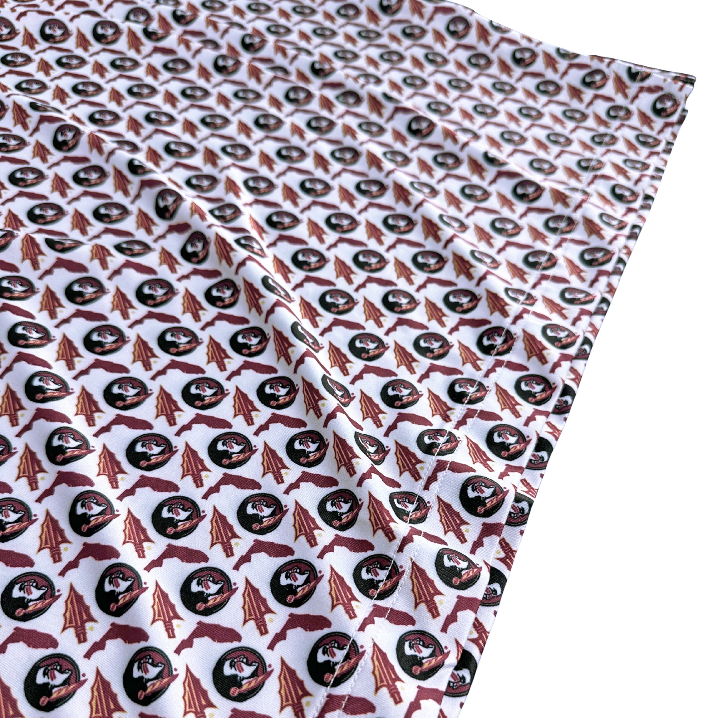 Patterned fabric with repeated design on a white background