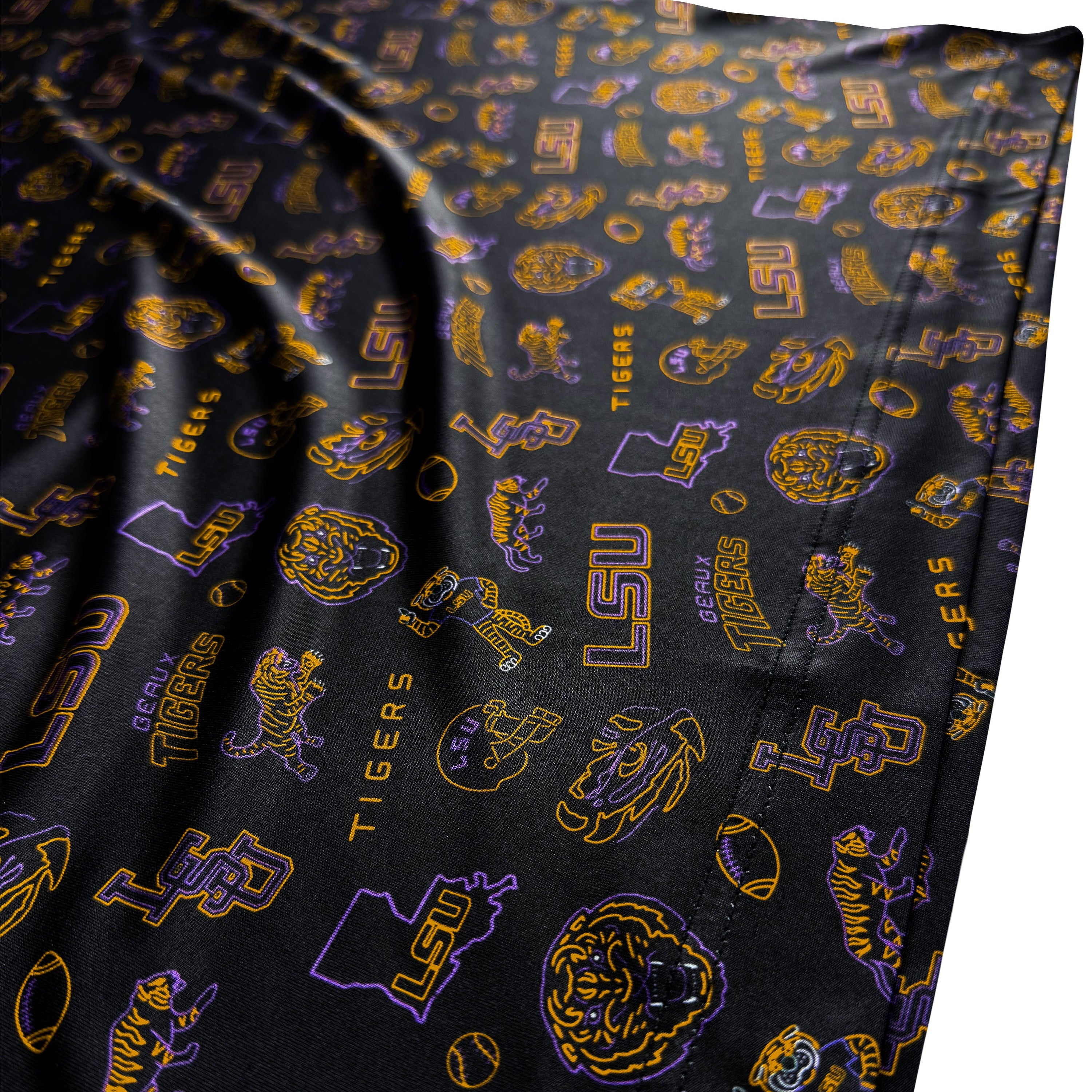 Black fabric with LSU Tigers logos and text