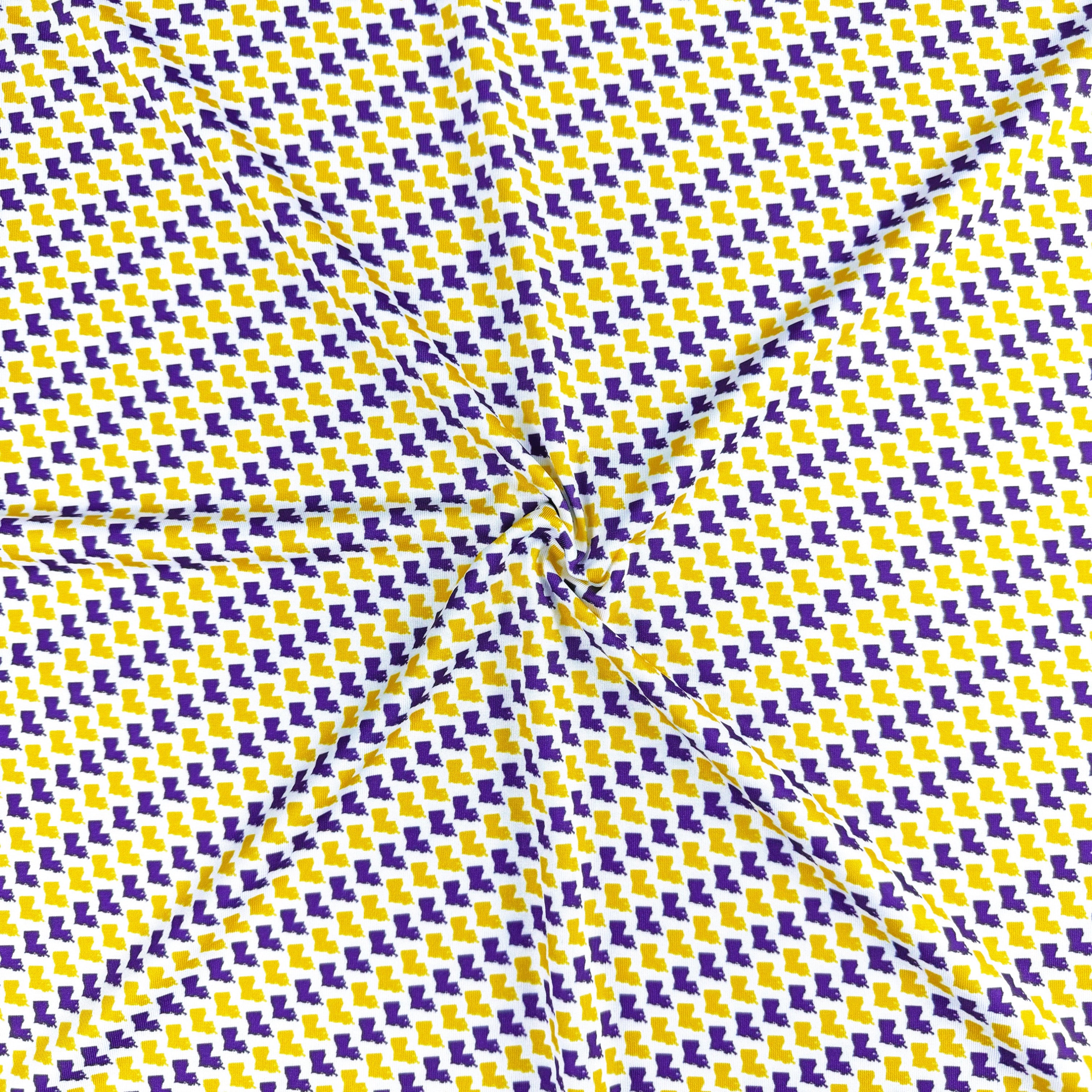 Pattern of purple and yellow arrows on a textured fabric background