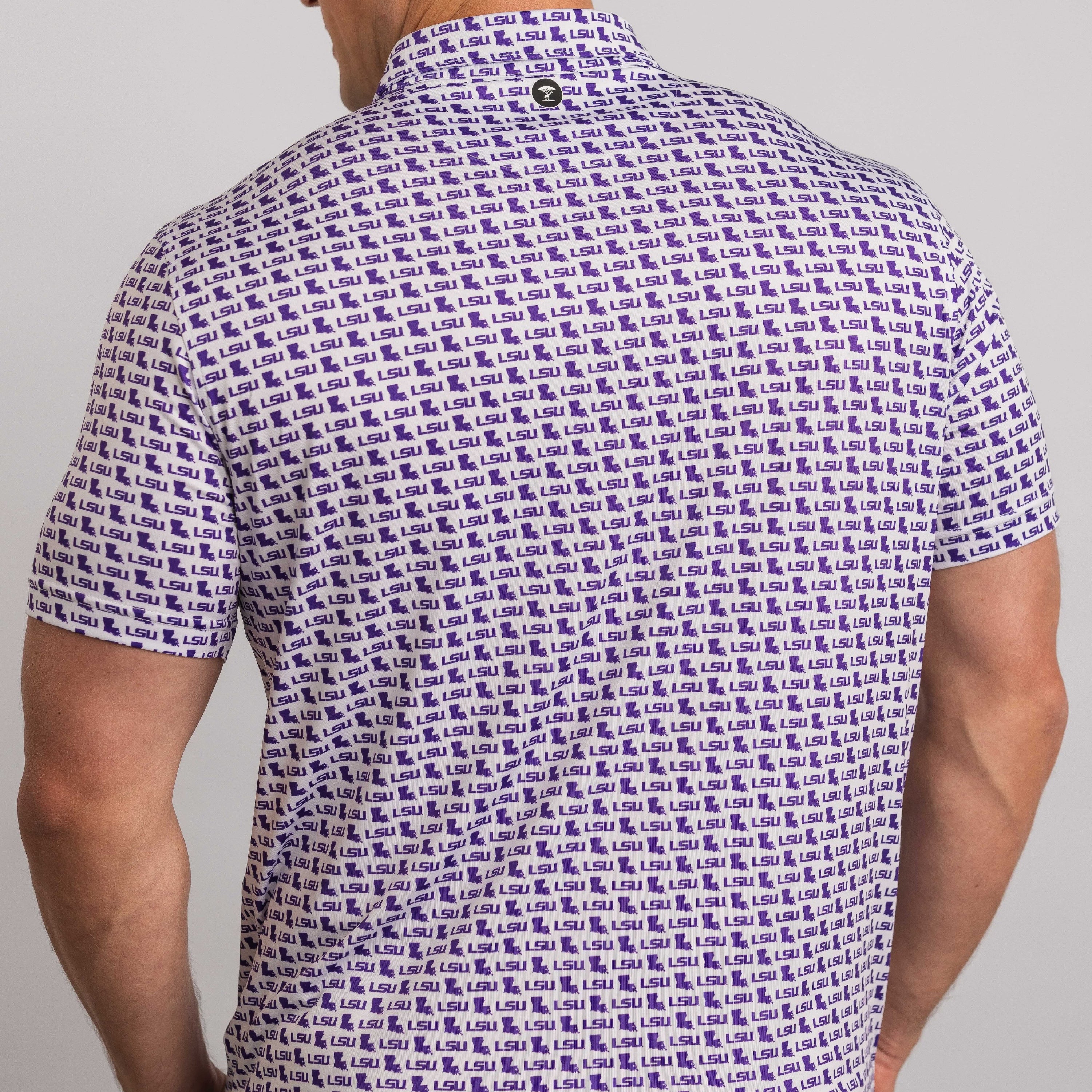 Man wearing a short-sleeve shirt with a blue pattern on a gray background