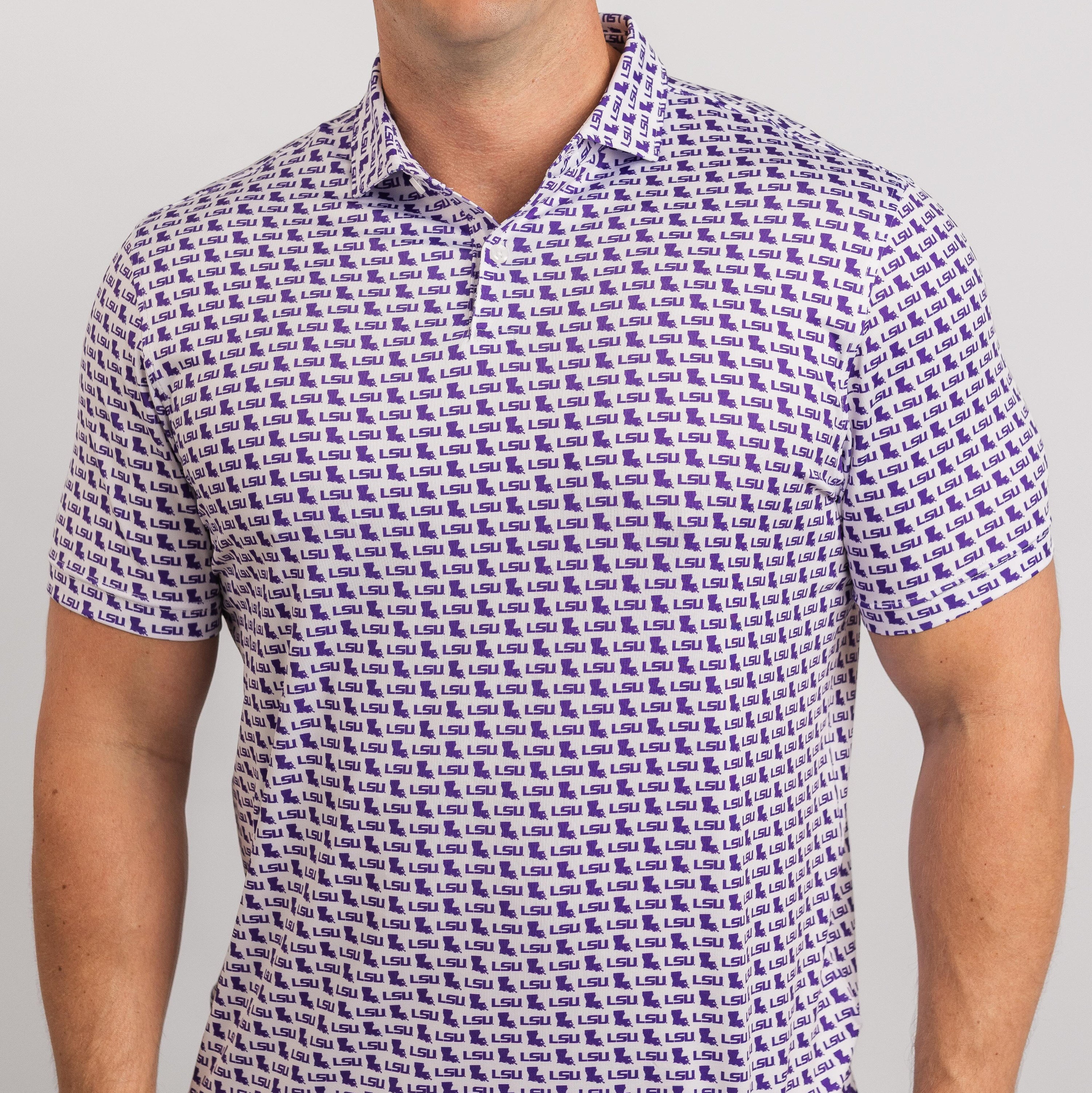 Man wearing a patterned shirt with a gray background