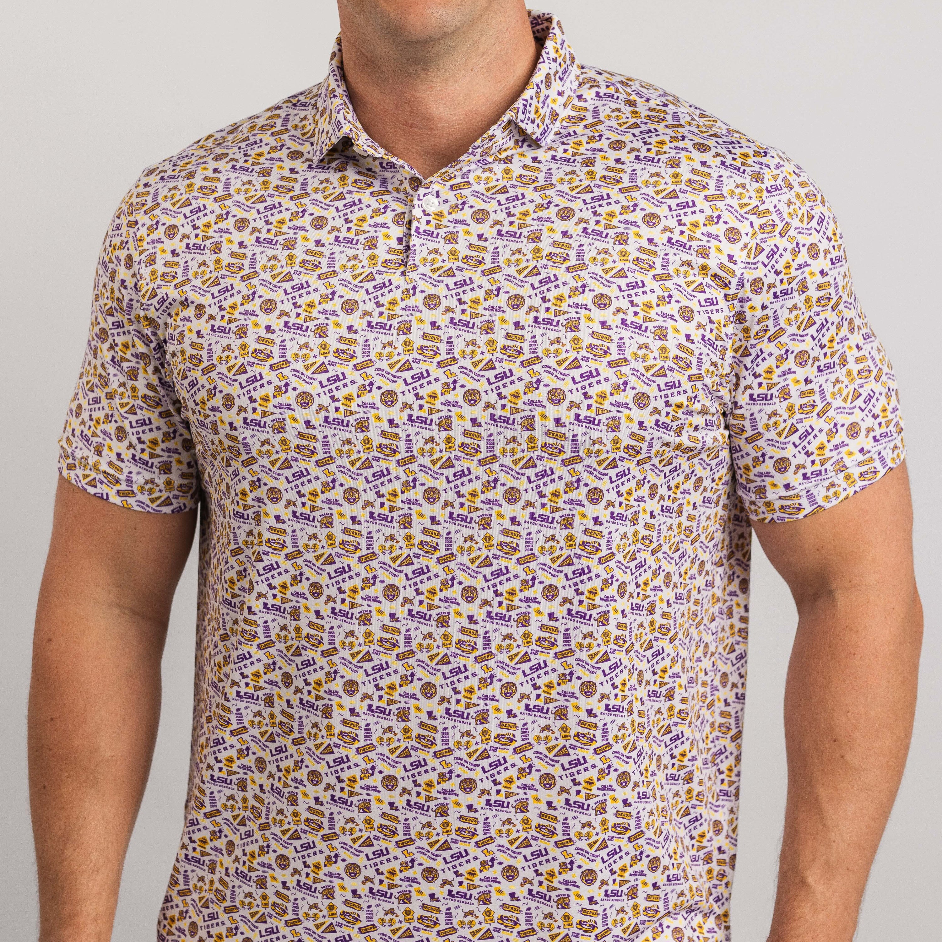 Man wearing a patterned shirt with a neutral background