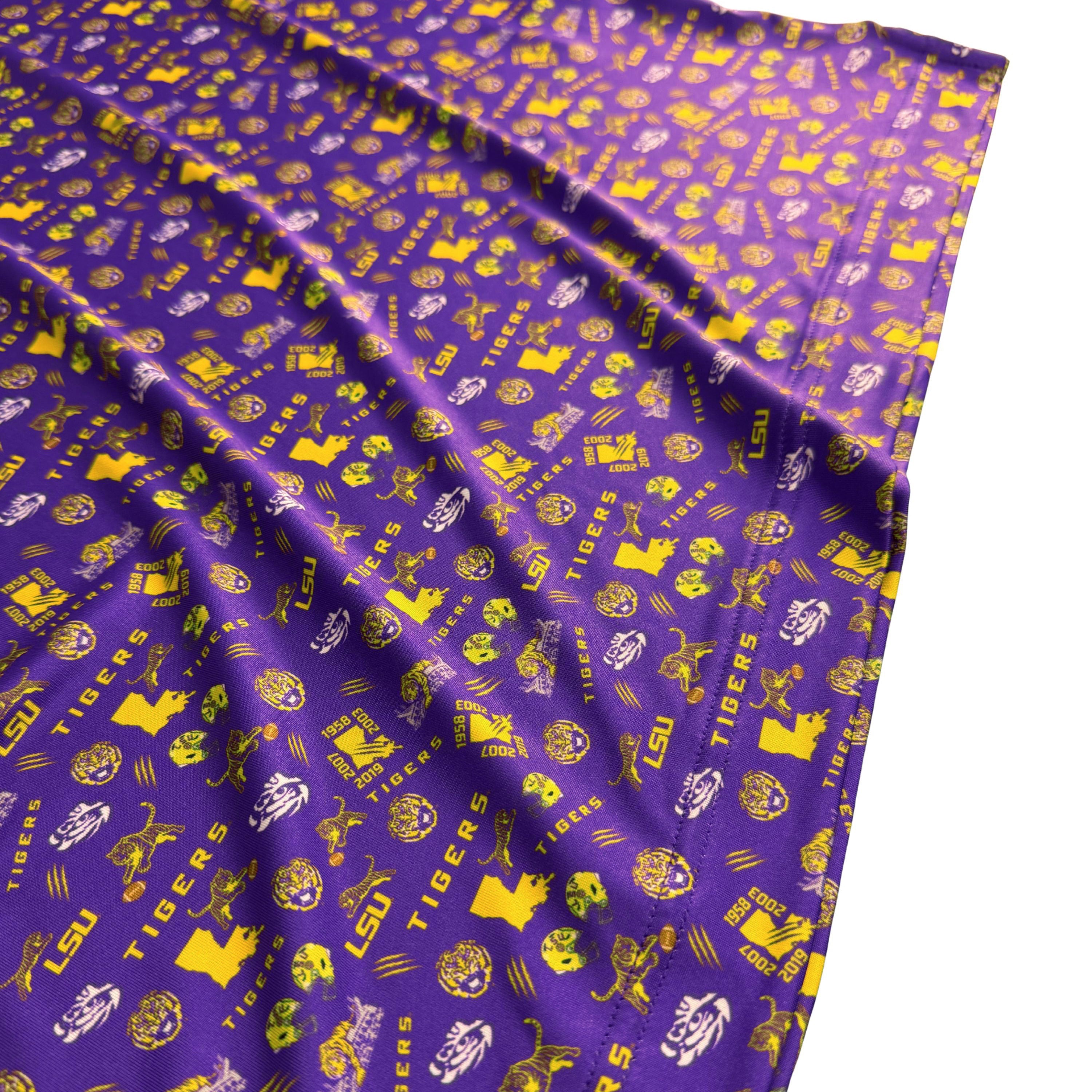Purple fabric with LSU Tigers logos and text on a white background