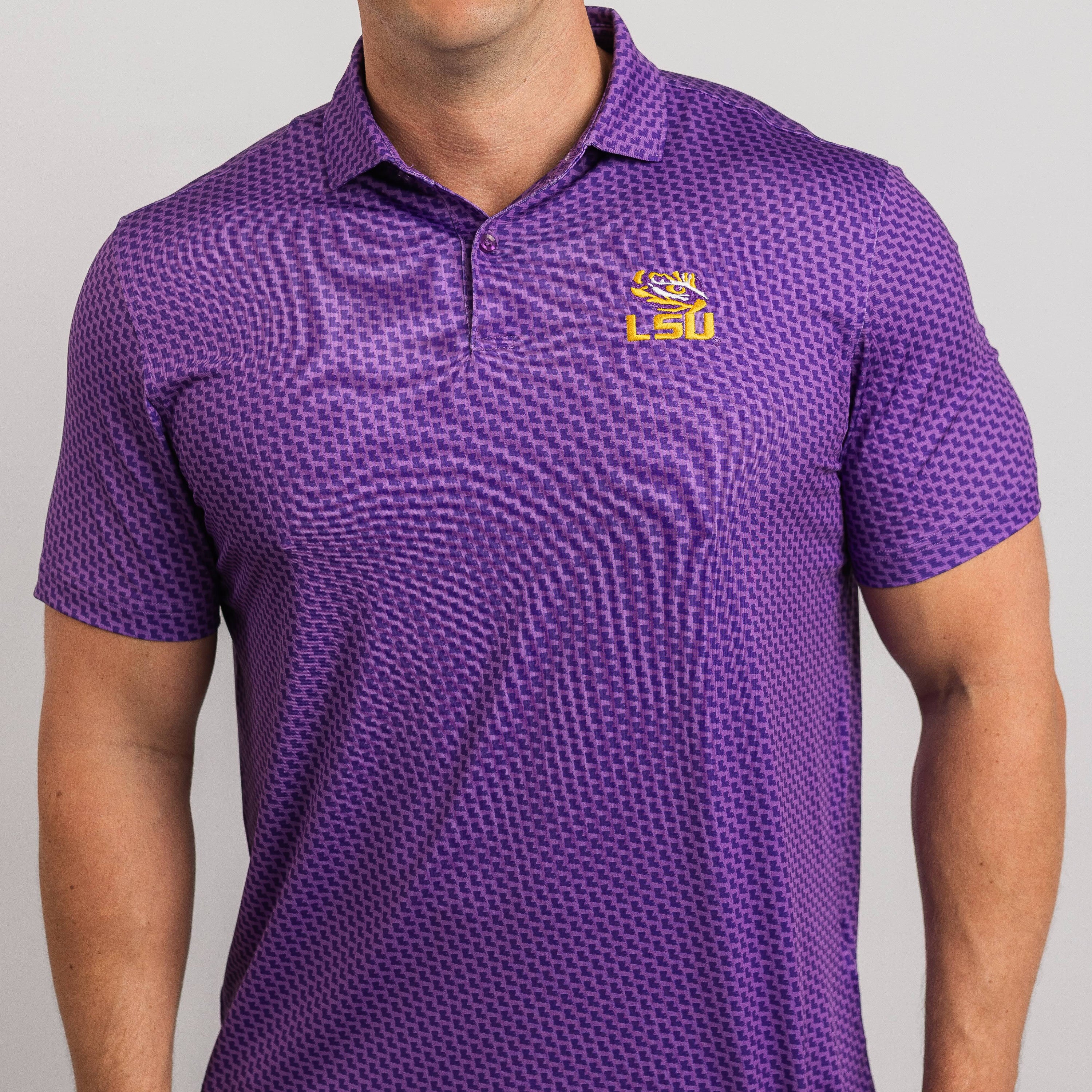 Man wearing a purple LSU polo shirt on a gray background