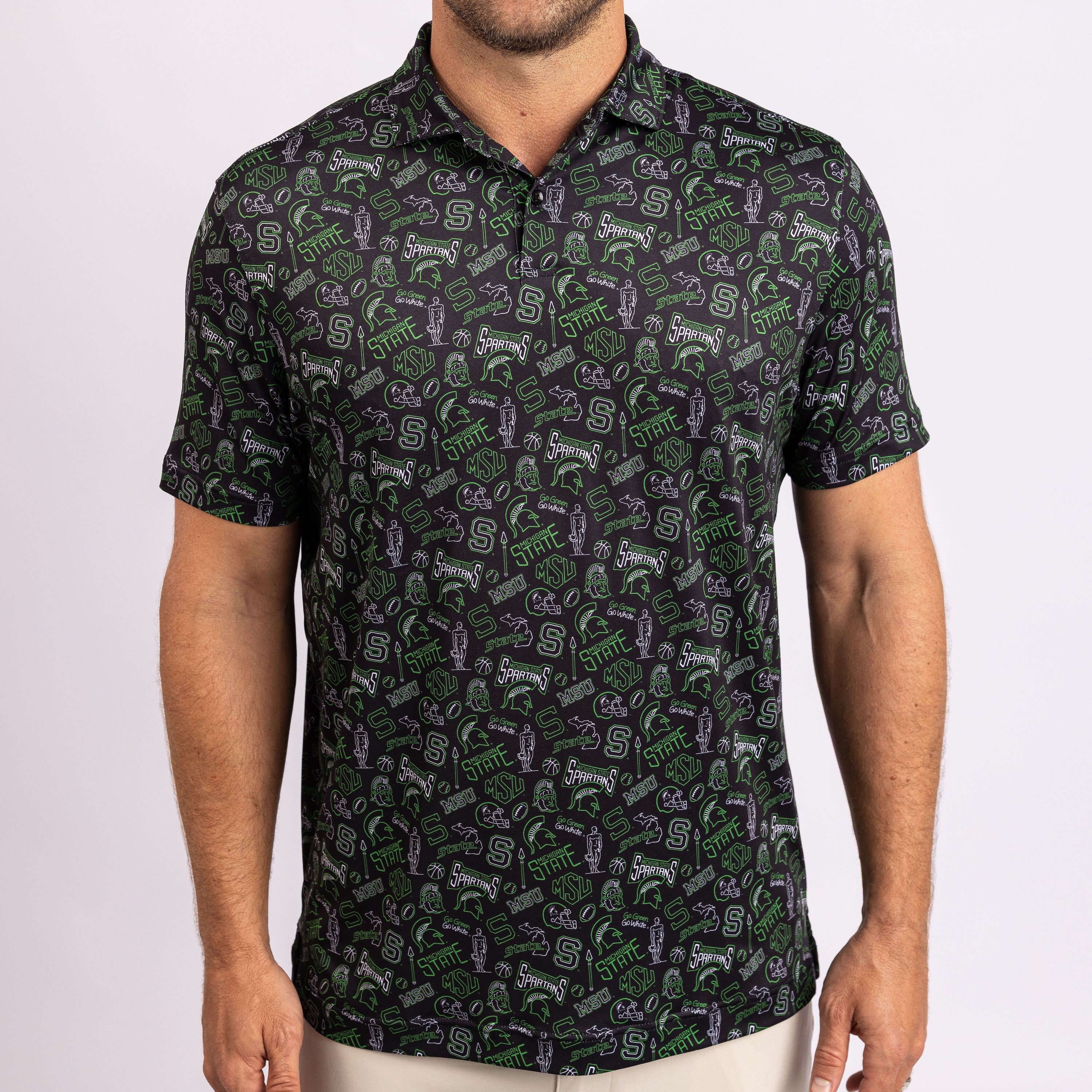 A man wearing a short-sleeve polo shirt with an all-over repeating MSU