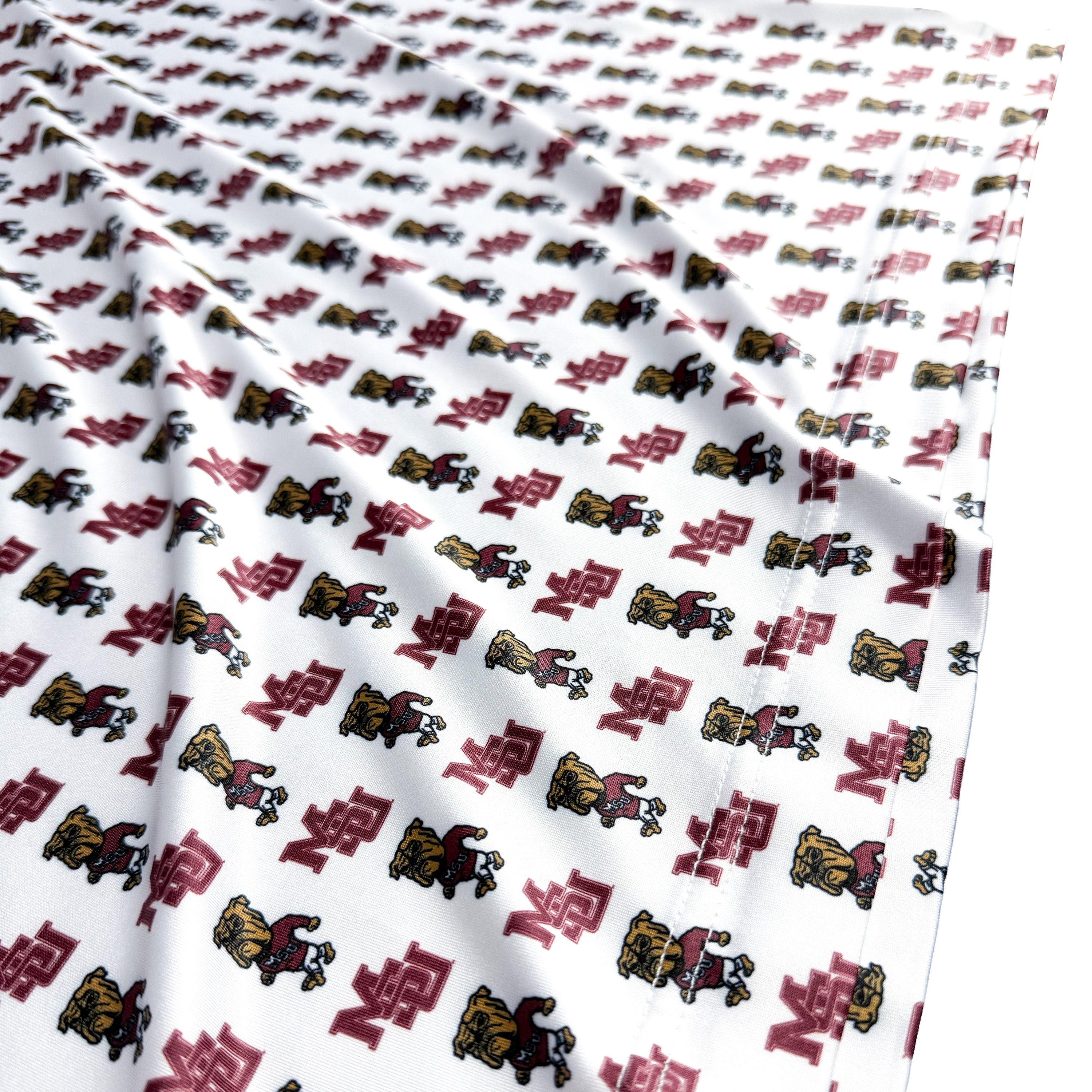 White fabric with black and red pattern