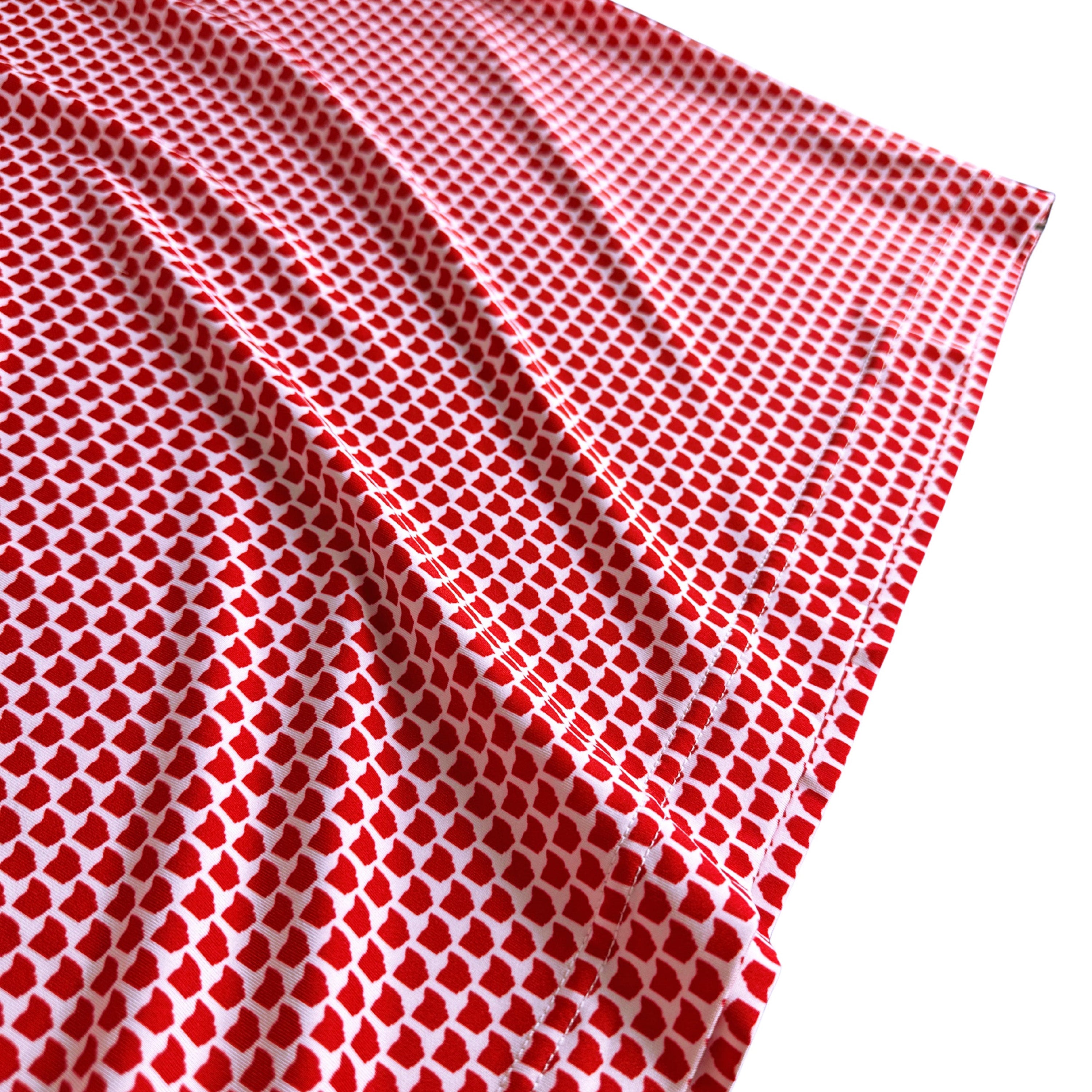 Red and white checkered fabric on a white background