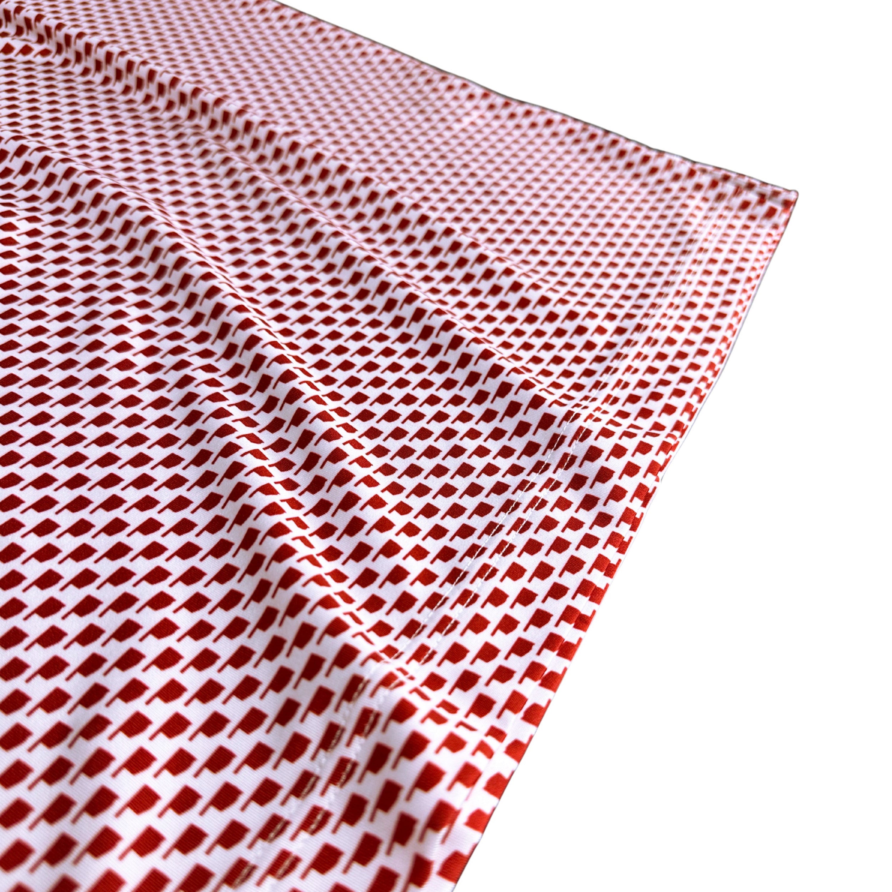 Red and white checkered fabric on a white background