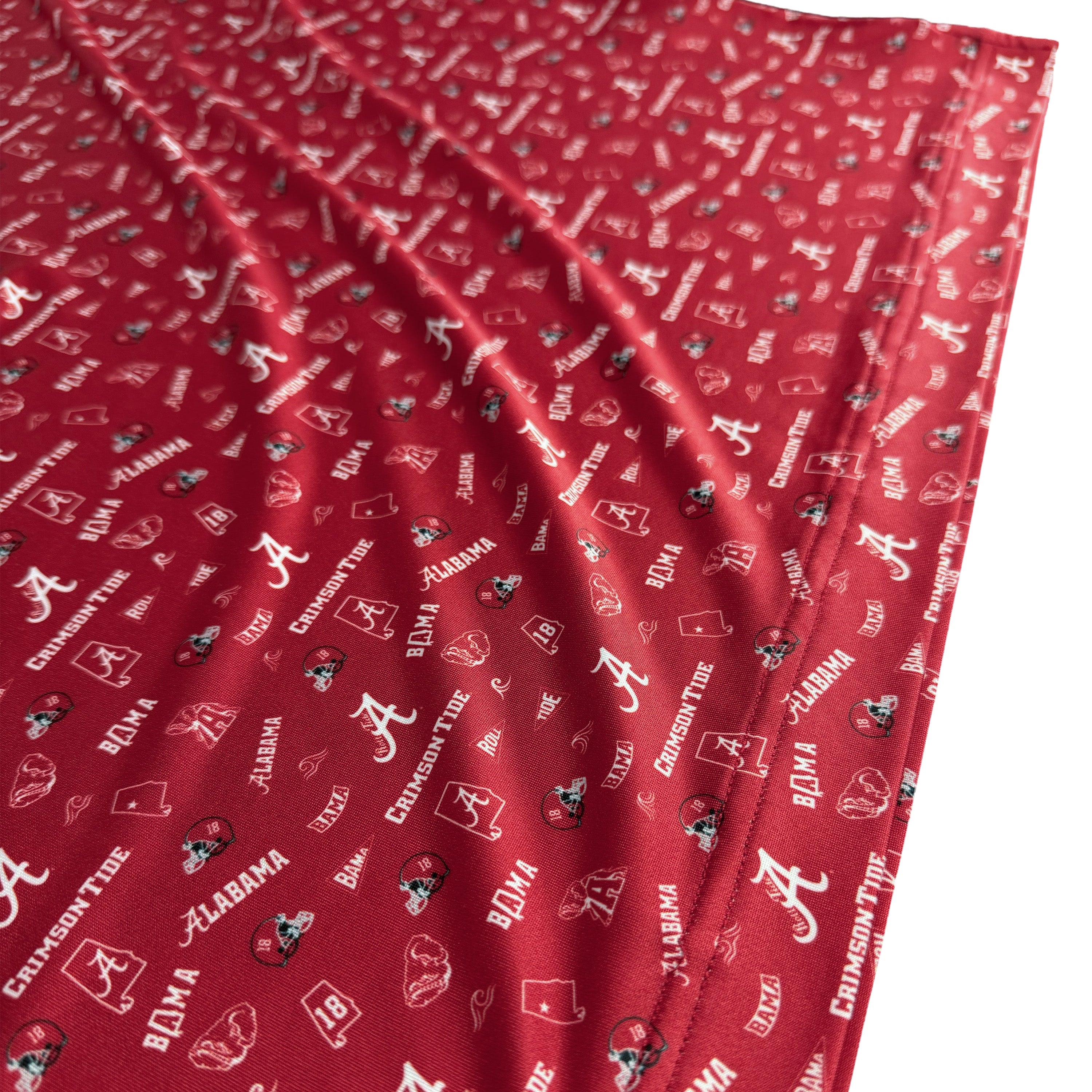 Red fabric with Alabama logo pattern
