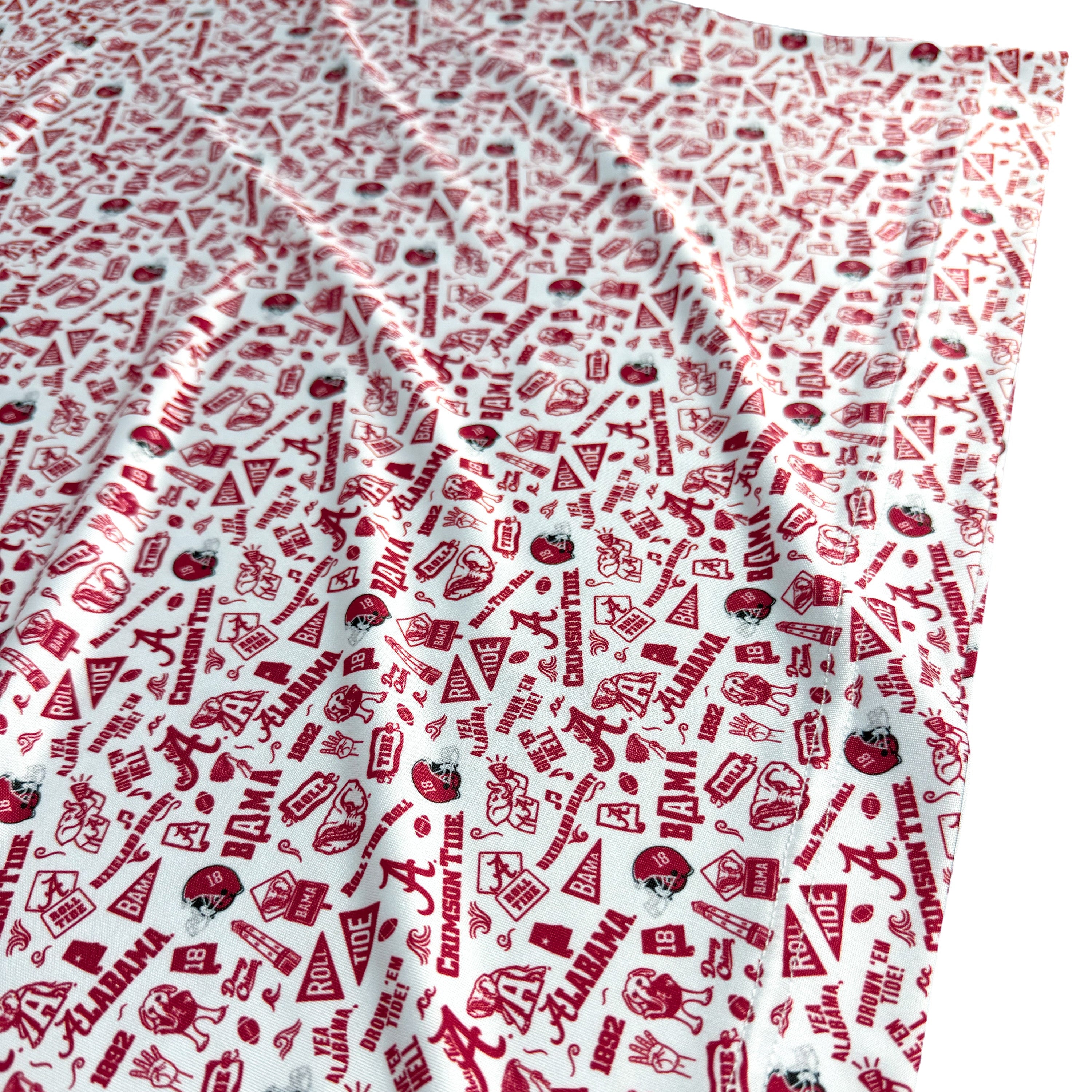 Red and white patterned fabric with various designs