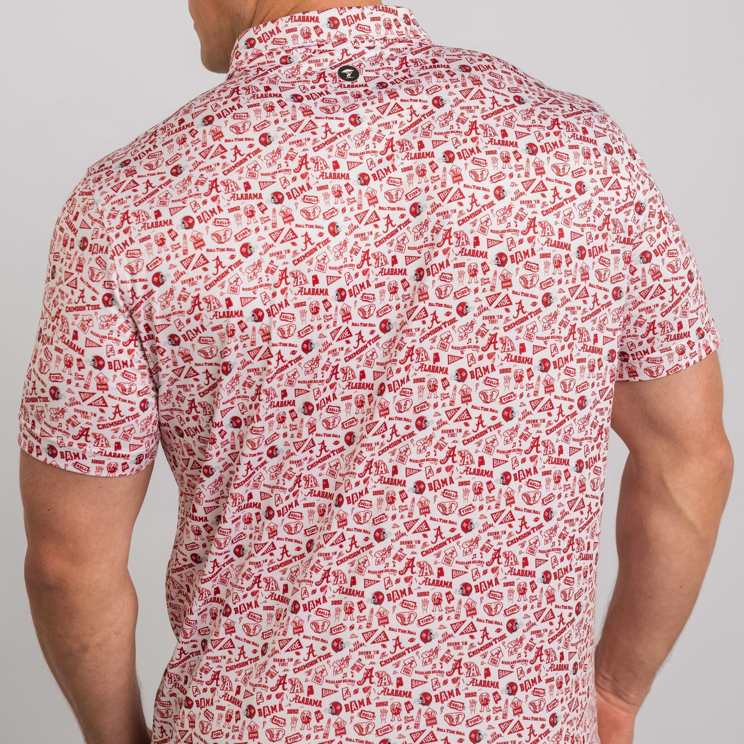 Man wearing a red and white patterned shirt on a gray background
