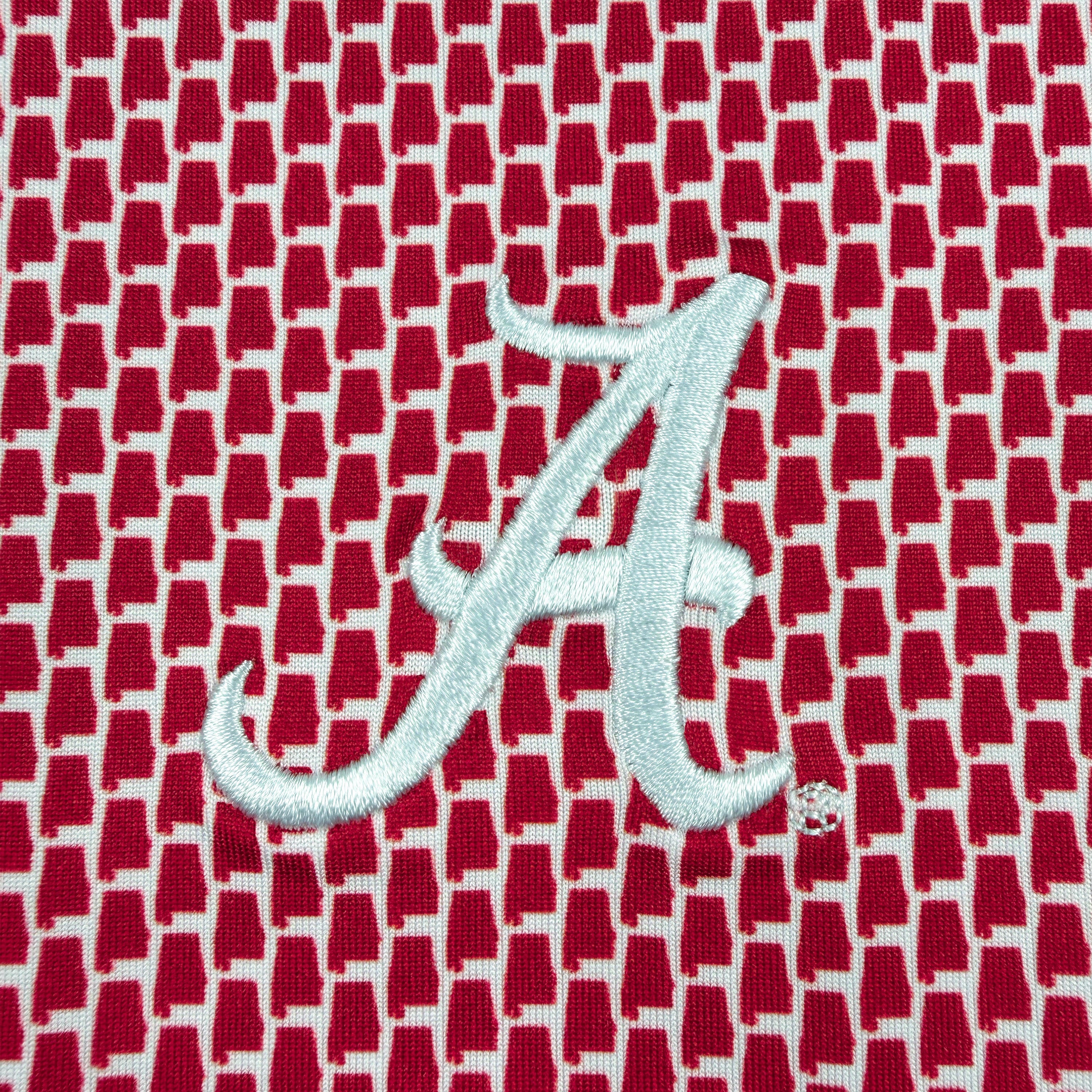 Red fabric with a white 'A' logo pattern