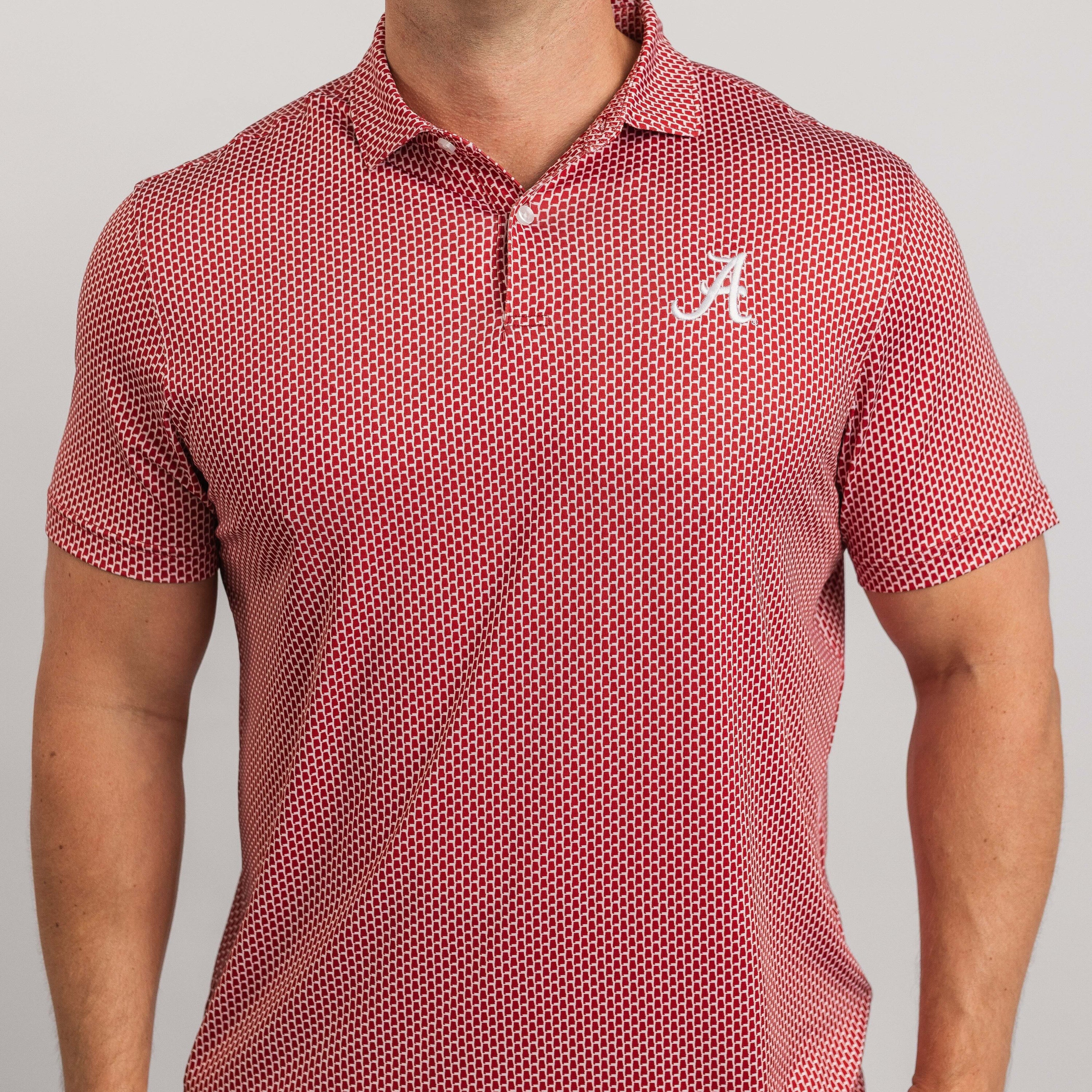 Red patterned polo shirt with a logo on a gray background