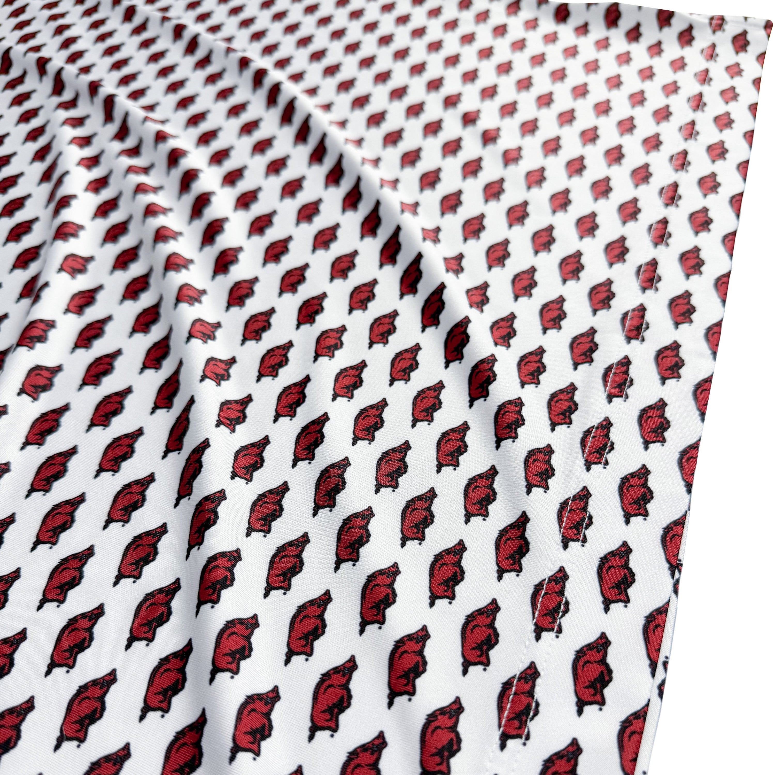 Fabric with red and black pattern on a white background