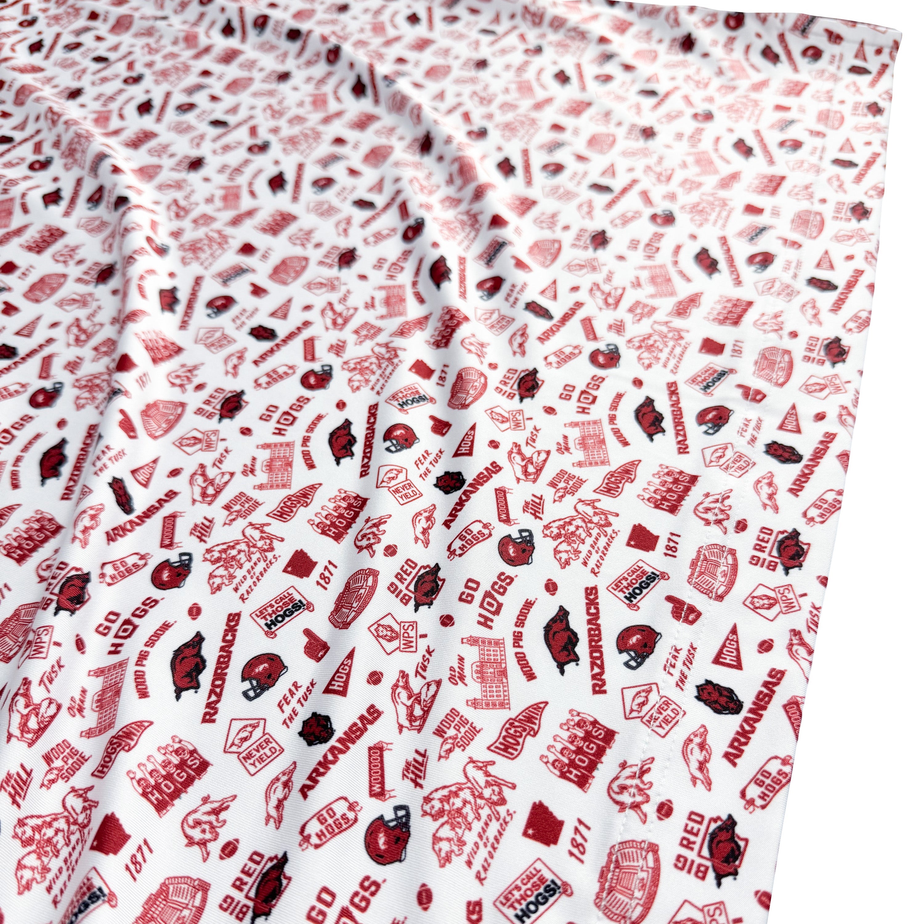 Fabric with red and black patterns on a white background