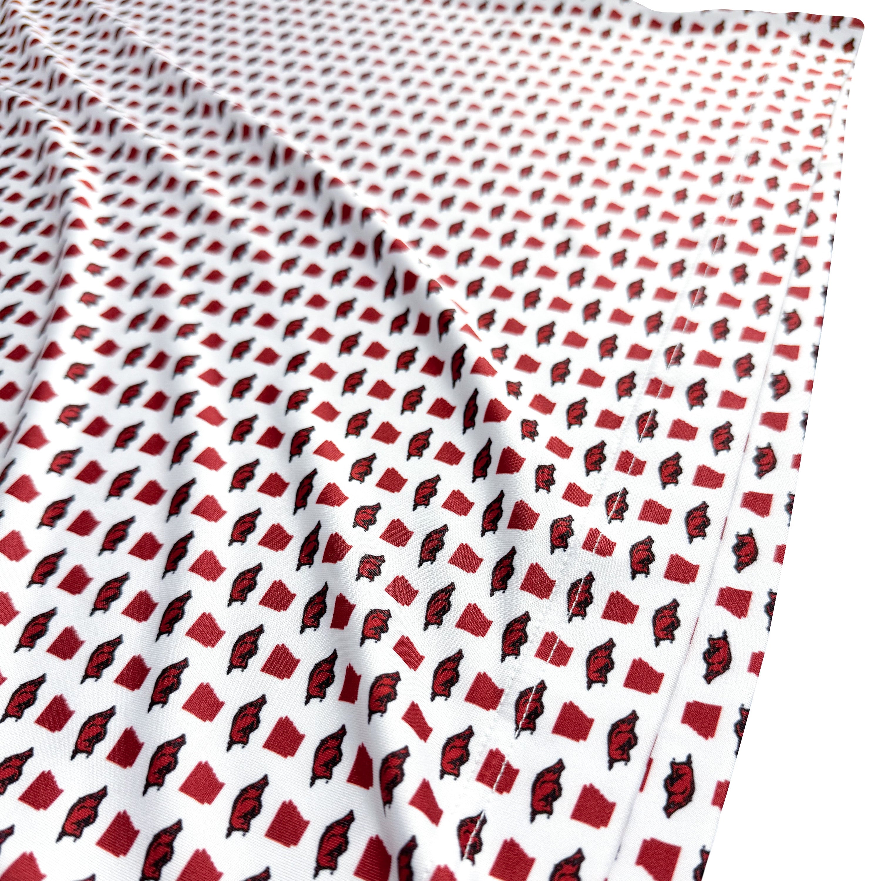 Fabric with red and black pattern on a white background