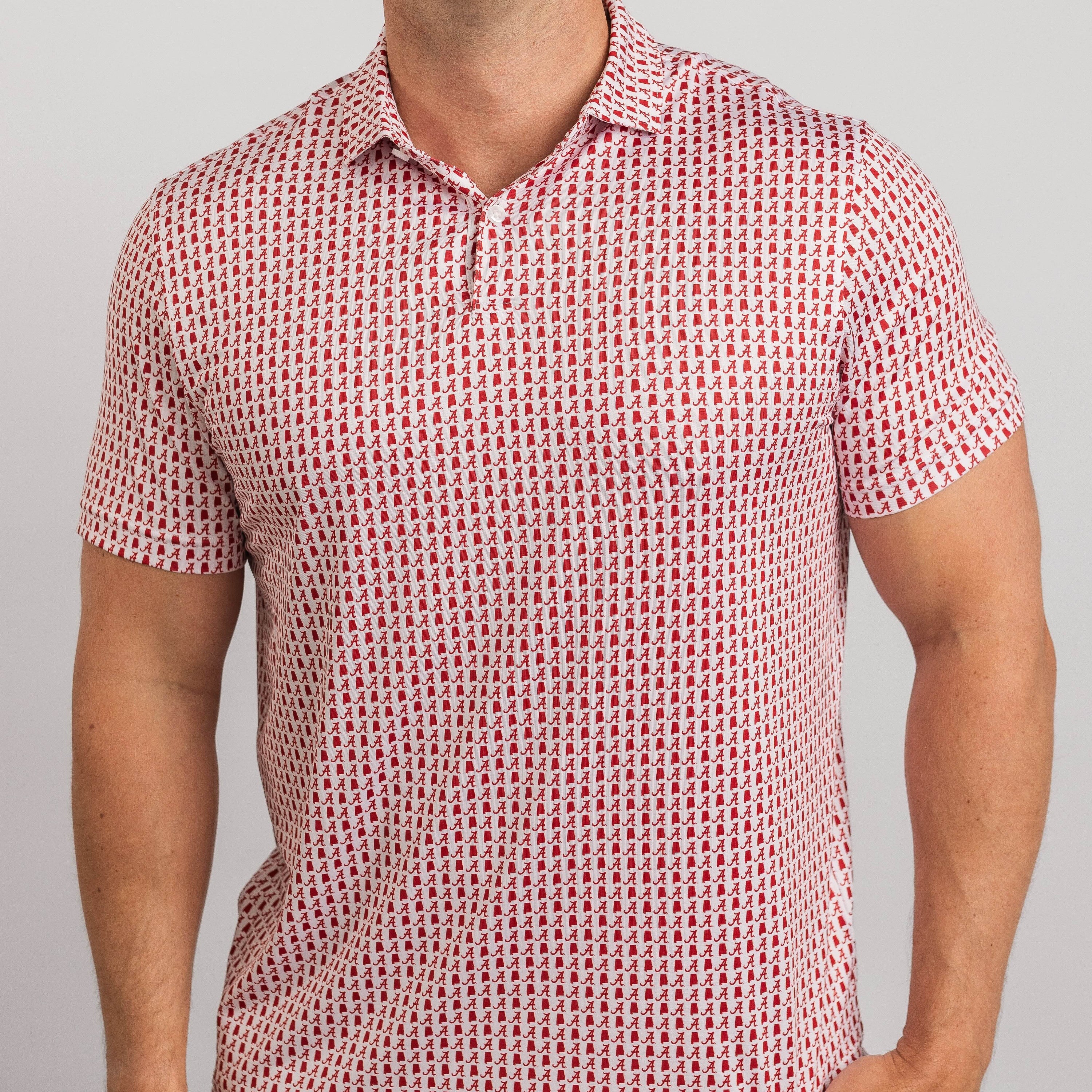 Man wearing a red and white patterned polo shirt against a gray background
