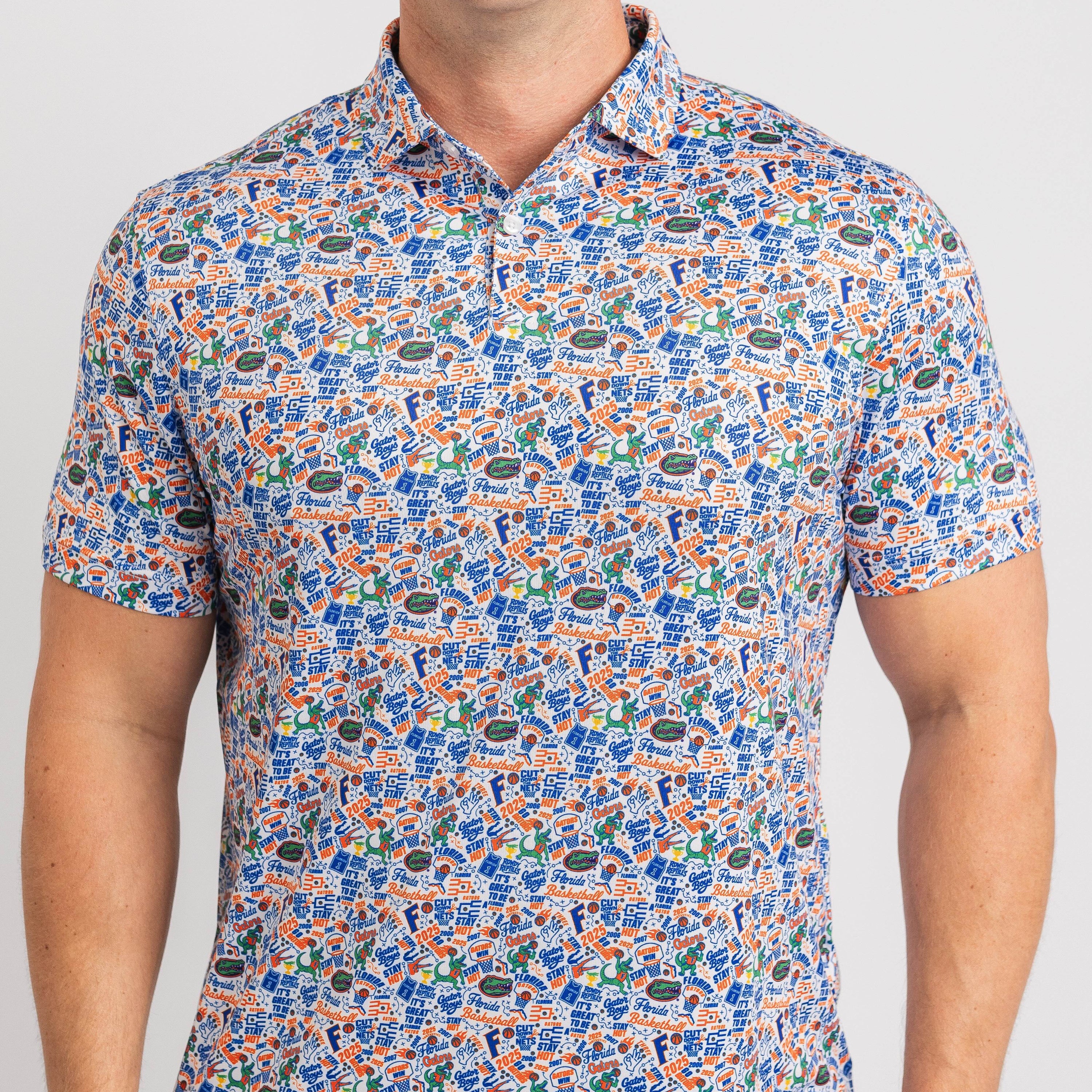 Person wearing a colorful patterned shirt on a plain background