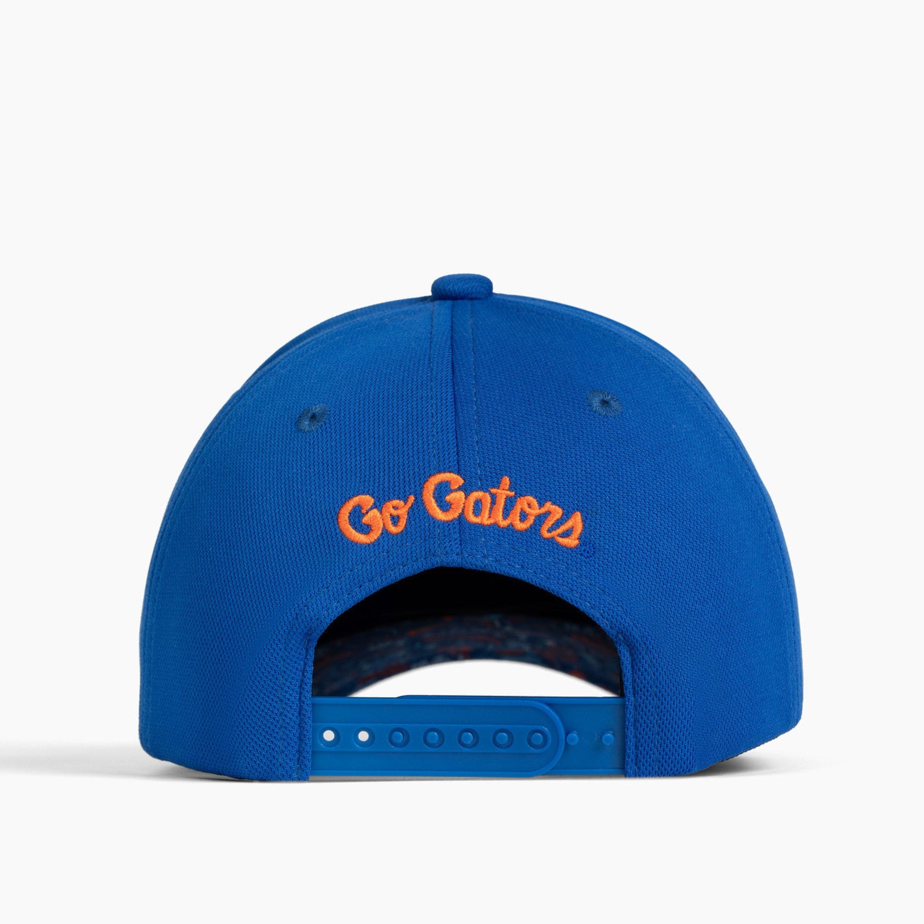 A royal blue baseball cap shown from the back, featuring 'Go Gators' embroidered in orange on the back. The cap is photographed on a clean, light gray studio background.
