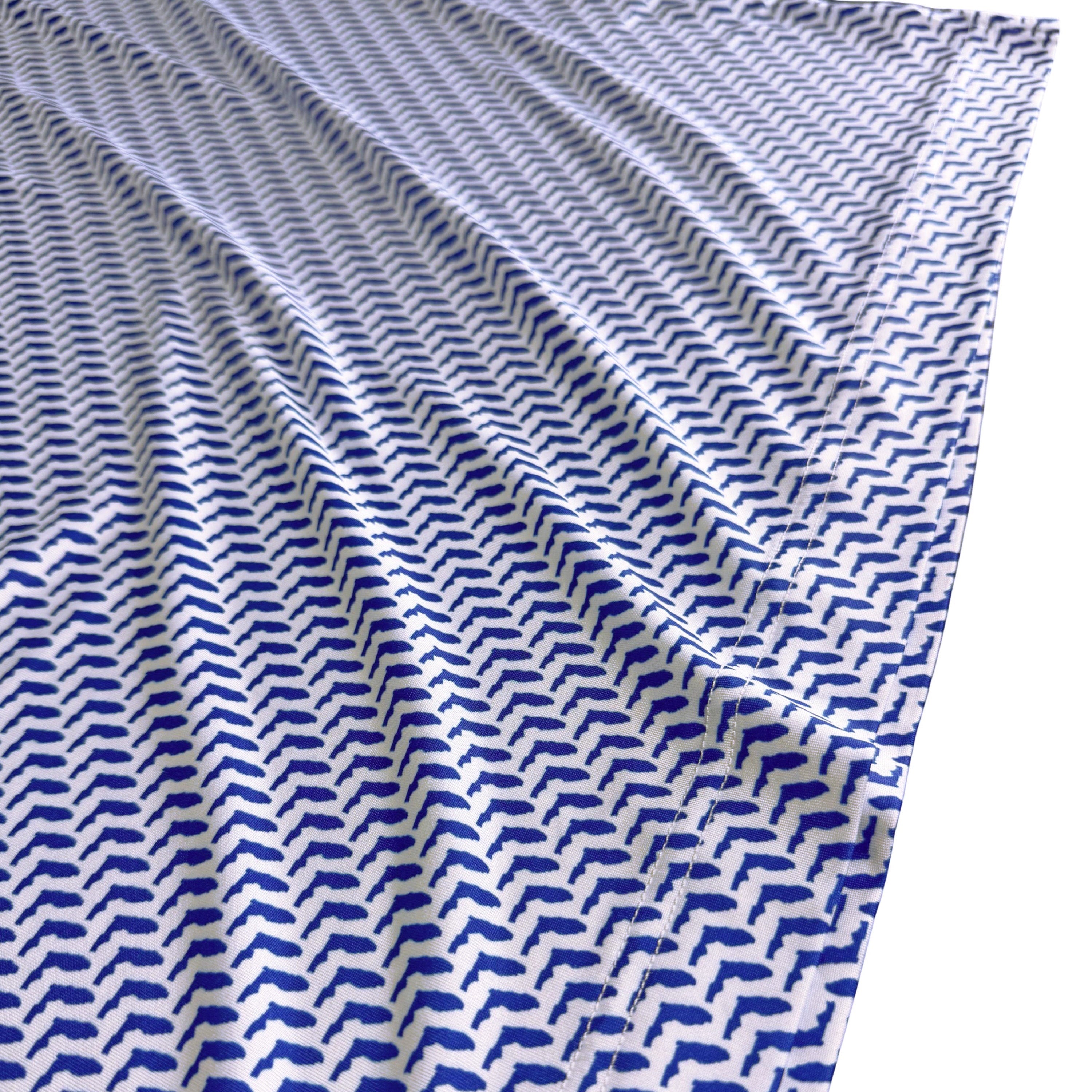 Blue and white patterned fabric on a white background