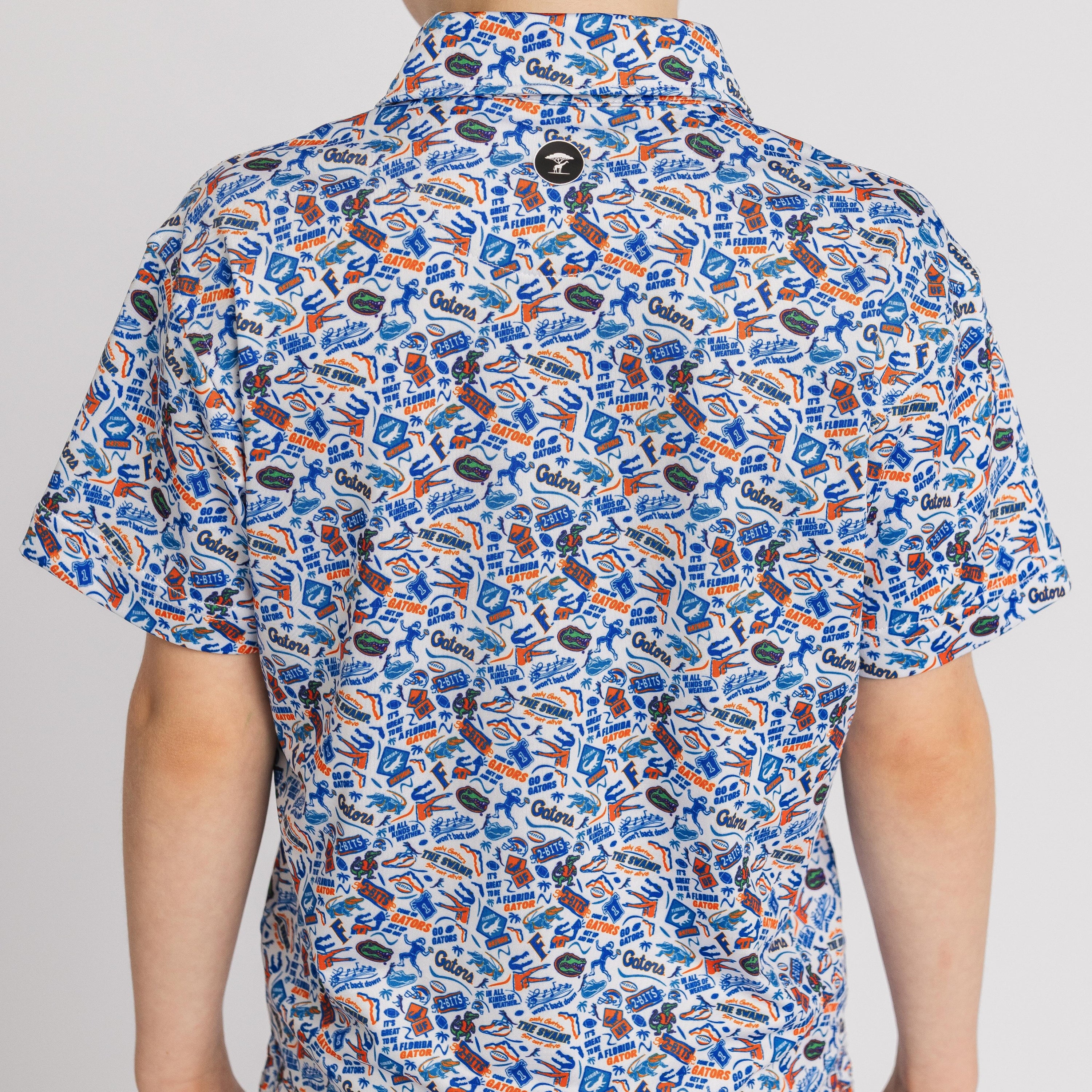 Short-sleeve shirt with colorful pattern on a plain background