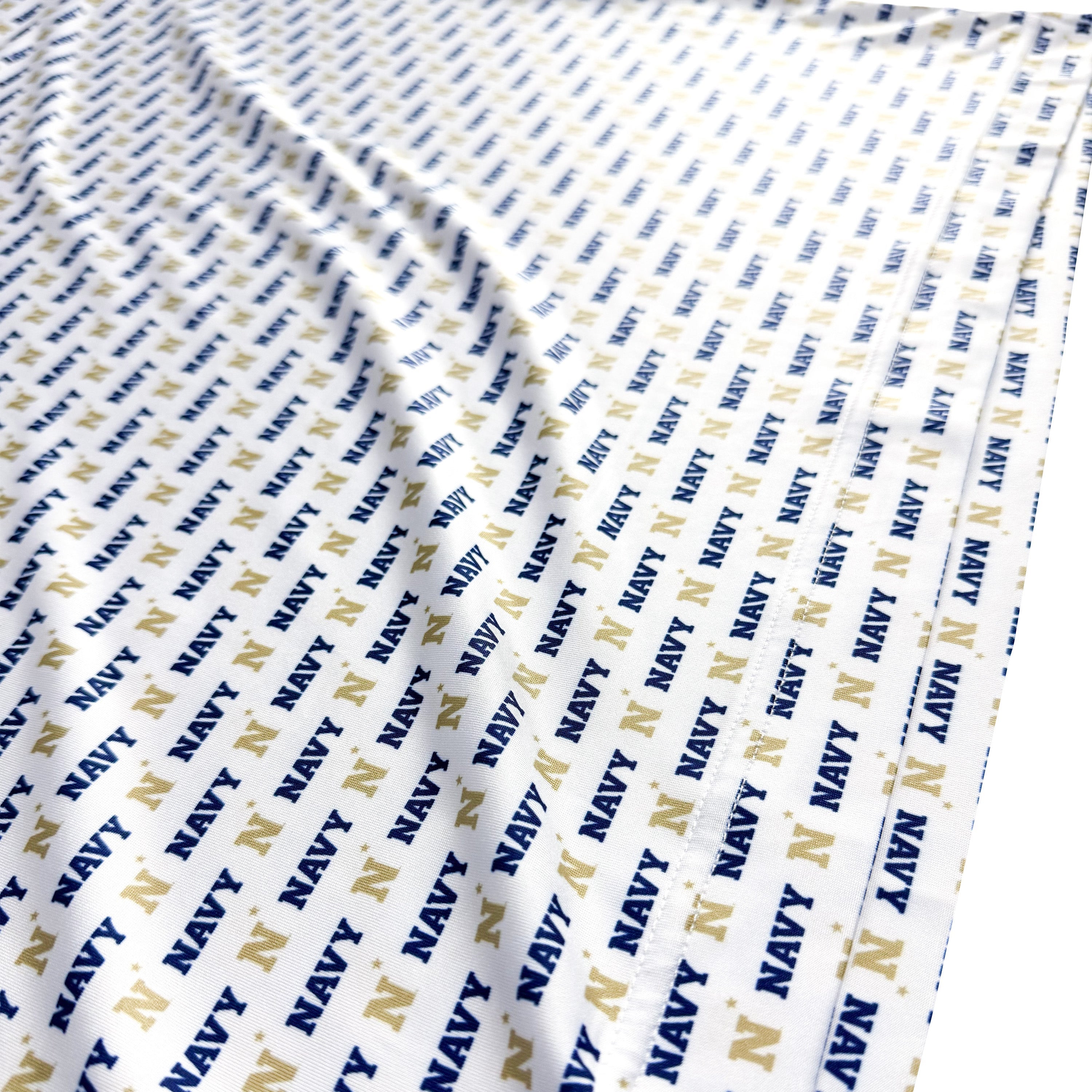 Fabric with 'Navy' text pattern on a white background