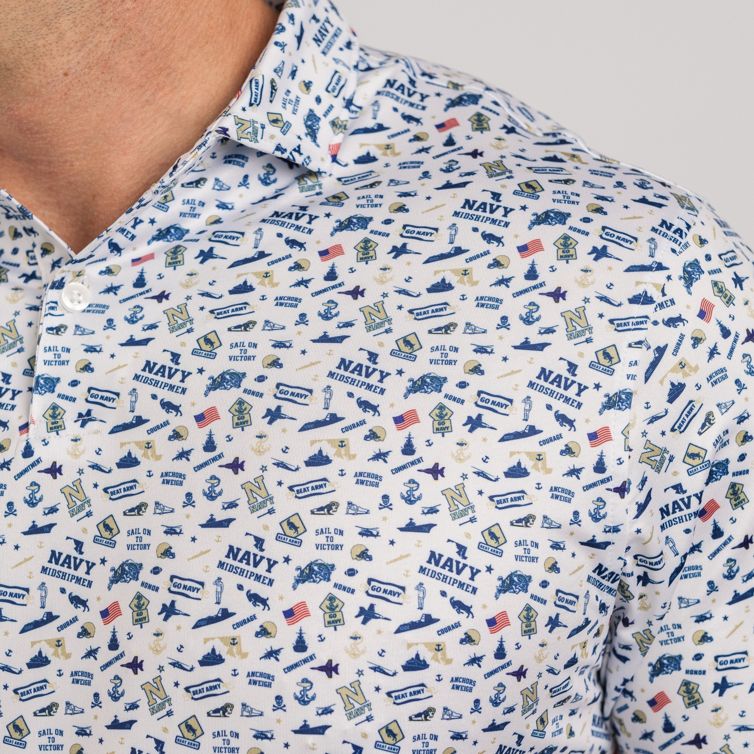 Close-up of a patterned shirt with navy-themed designs on a neutral background