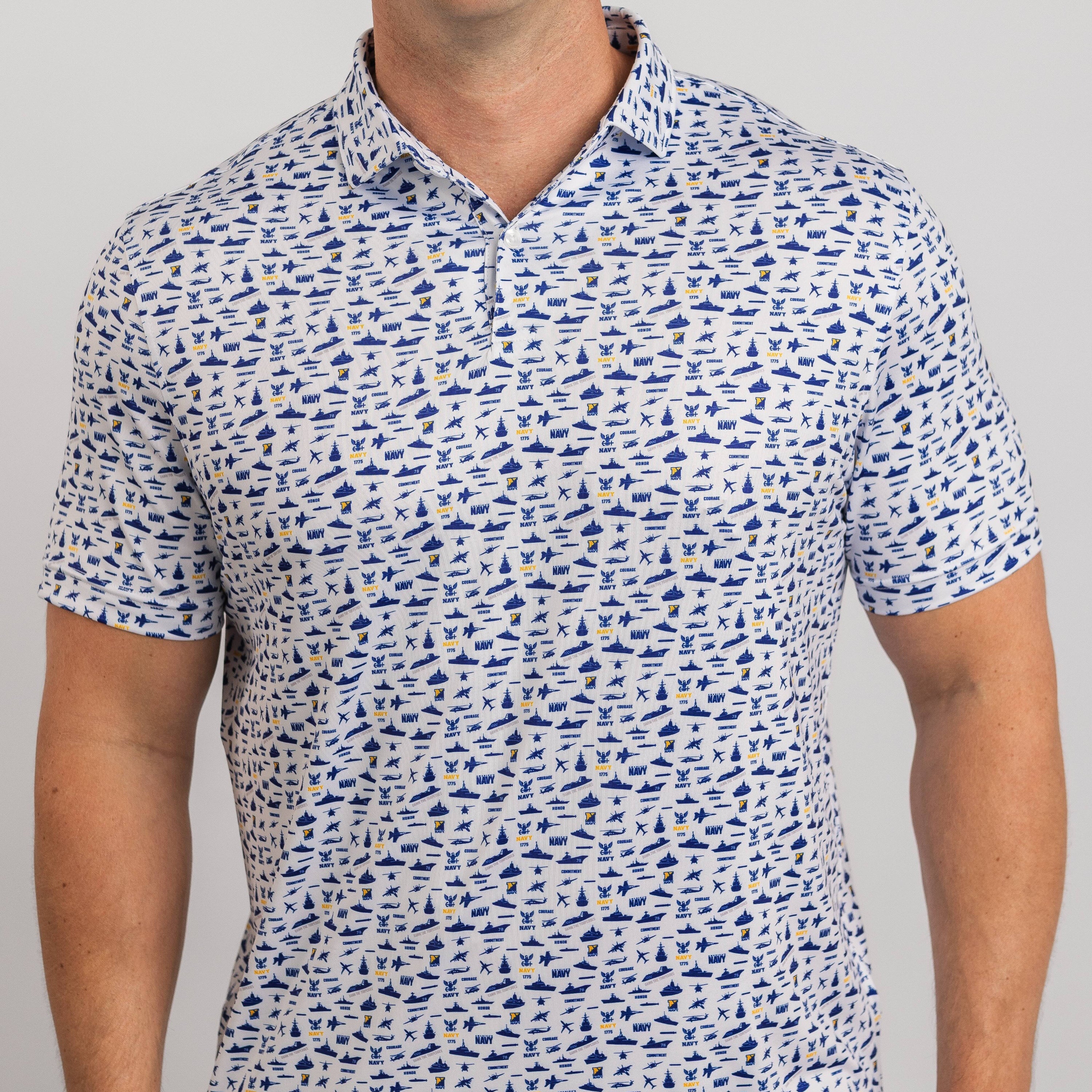 Man wearing a blue and white patterned polo shirt on a gray background